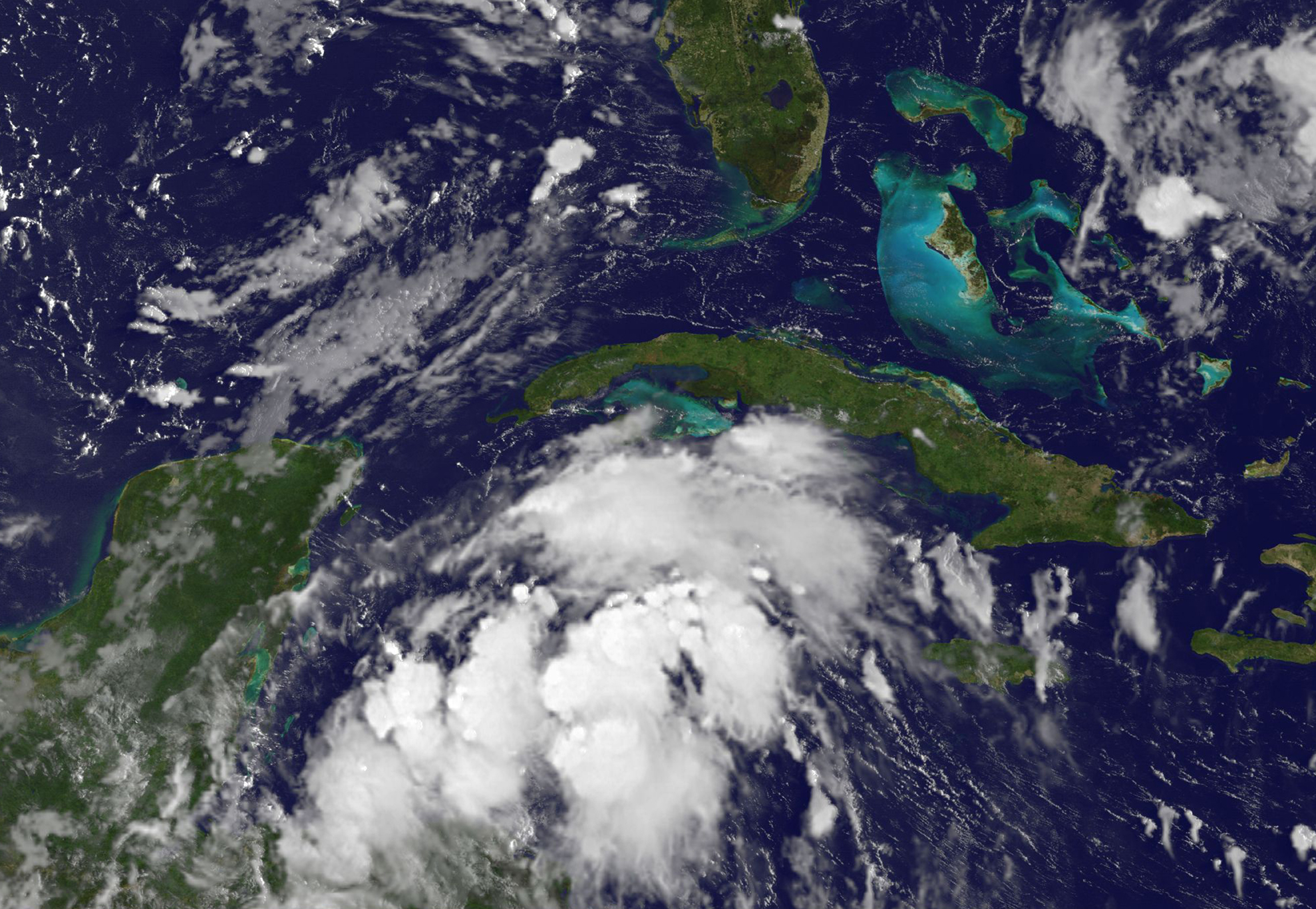 Satellite image of Harvey, a disorganized cloud mass in the Caribbean.