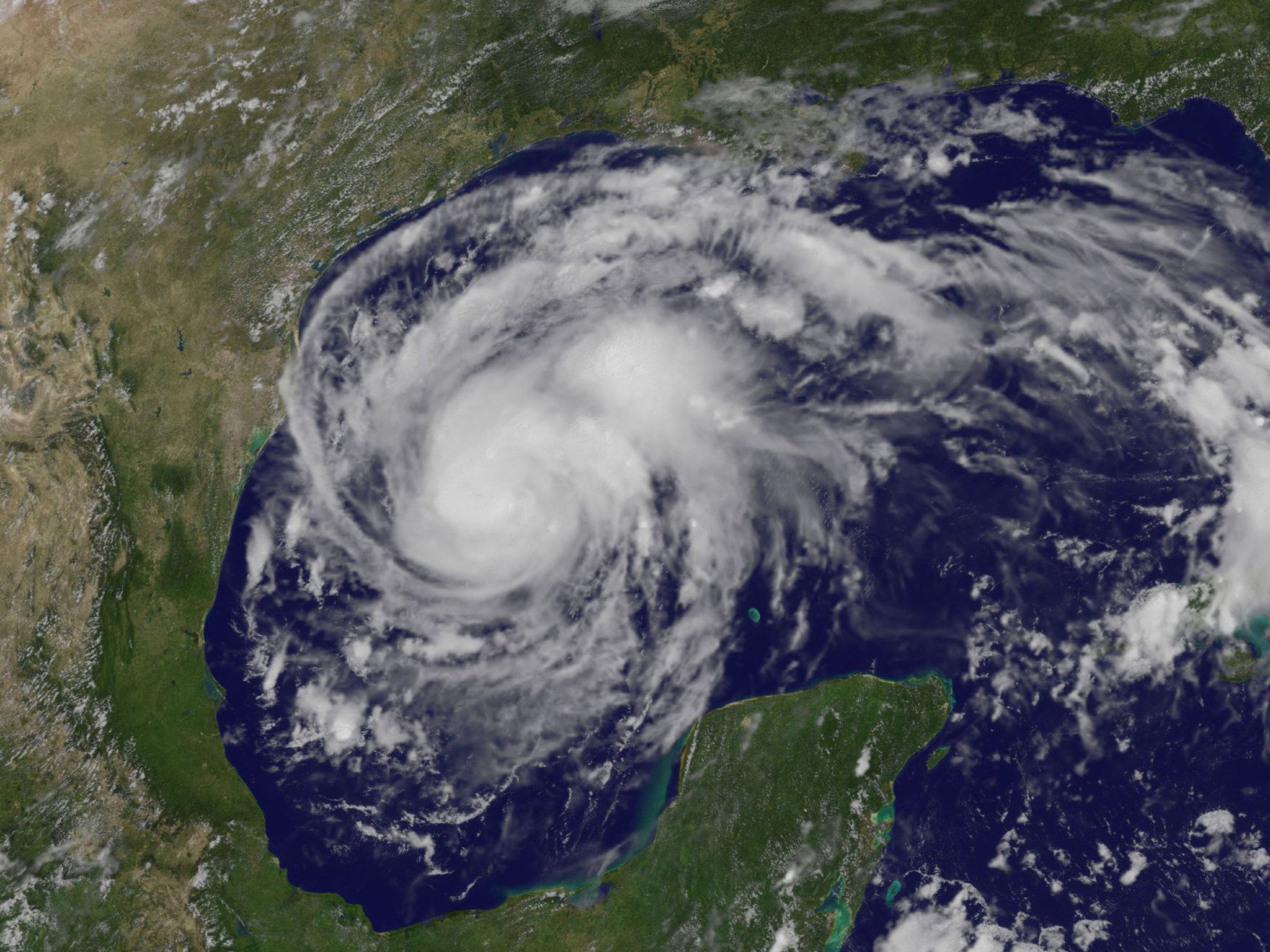 Satellite image of Harvey, a spiraling cloud mass over the Gulf of Mexico.