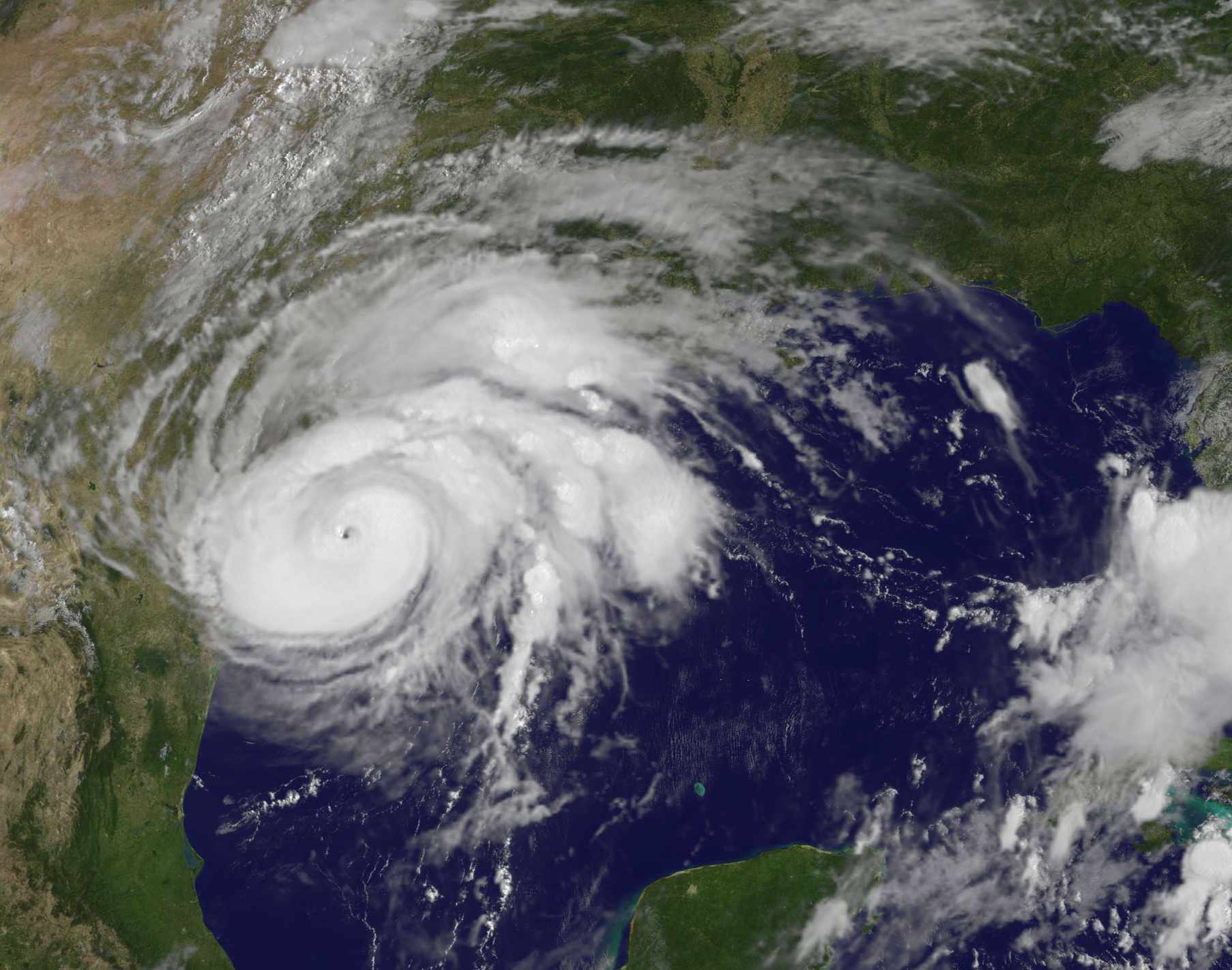 Satellite image of Harvey, a swirling cloud mass over the coast of eastern Texas.