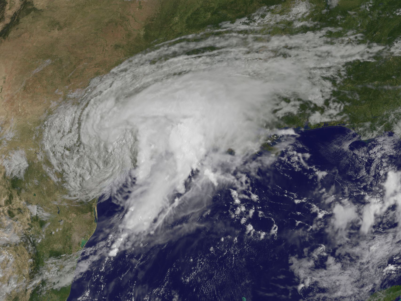 Satellite image of Harvey, a disorganized cloud mass along the Texas coast.