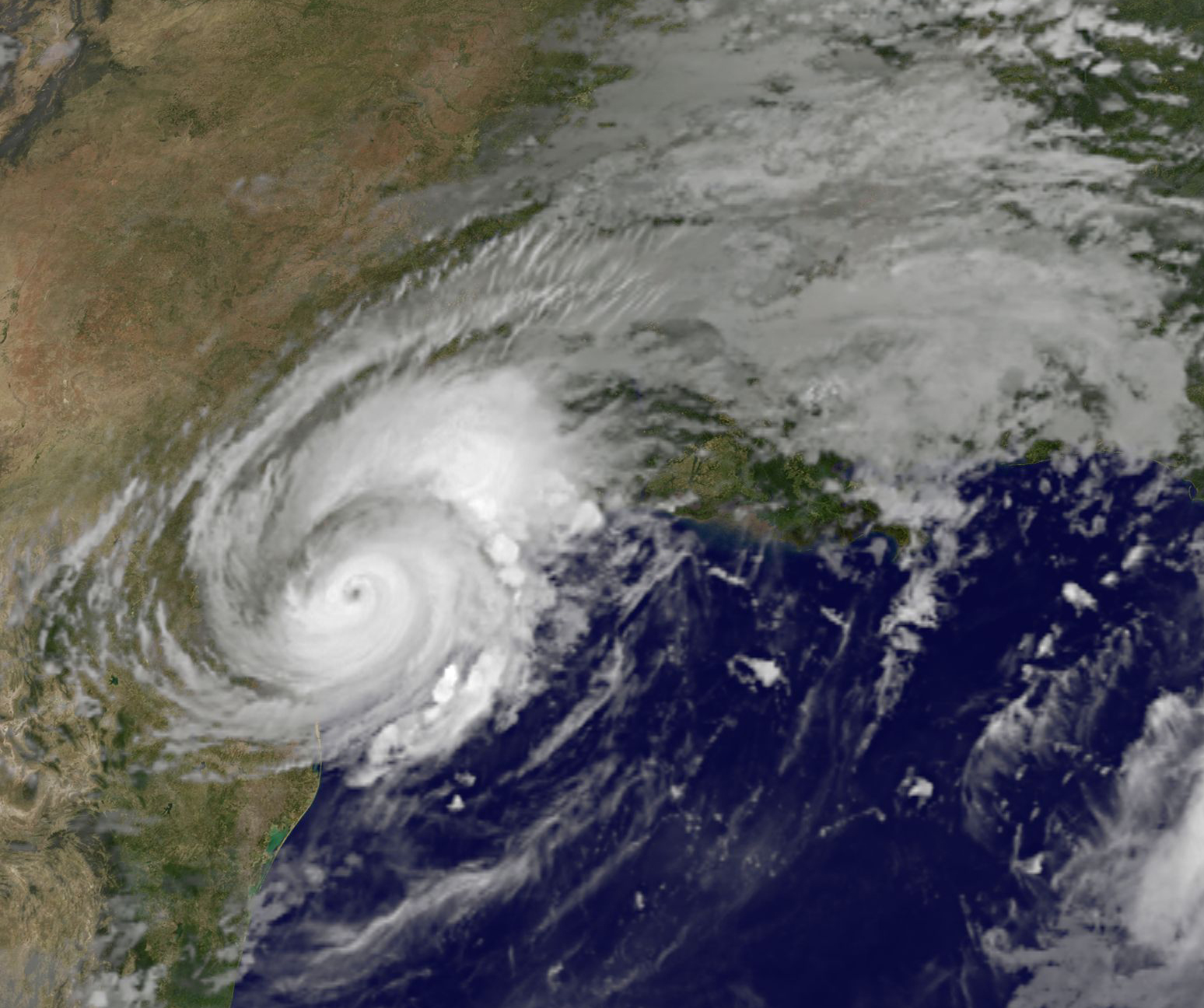 Satellite image of Harvey, a swirling cloud mass along the eastern coast of Texas.