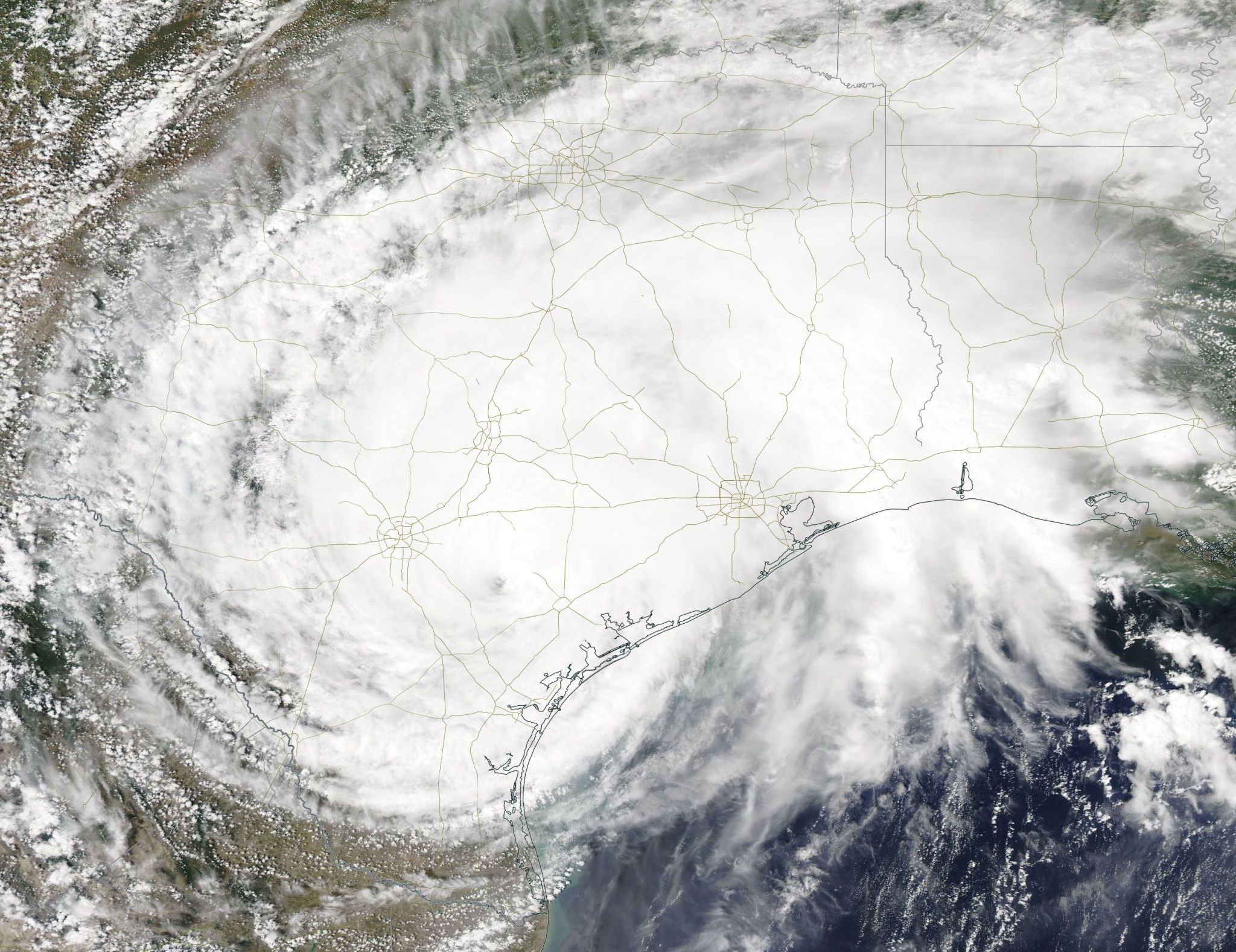 Satellite image of Harvey, a large circular cloud mass over most of Texas.
