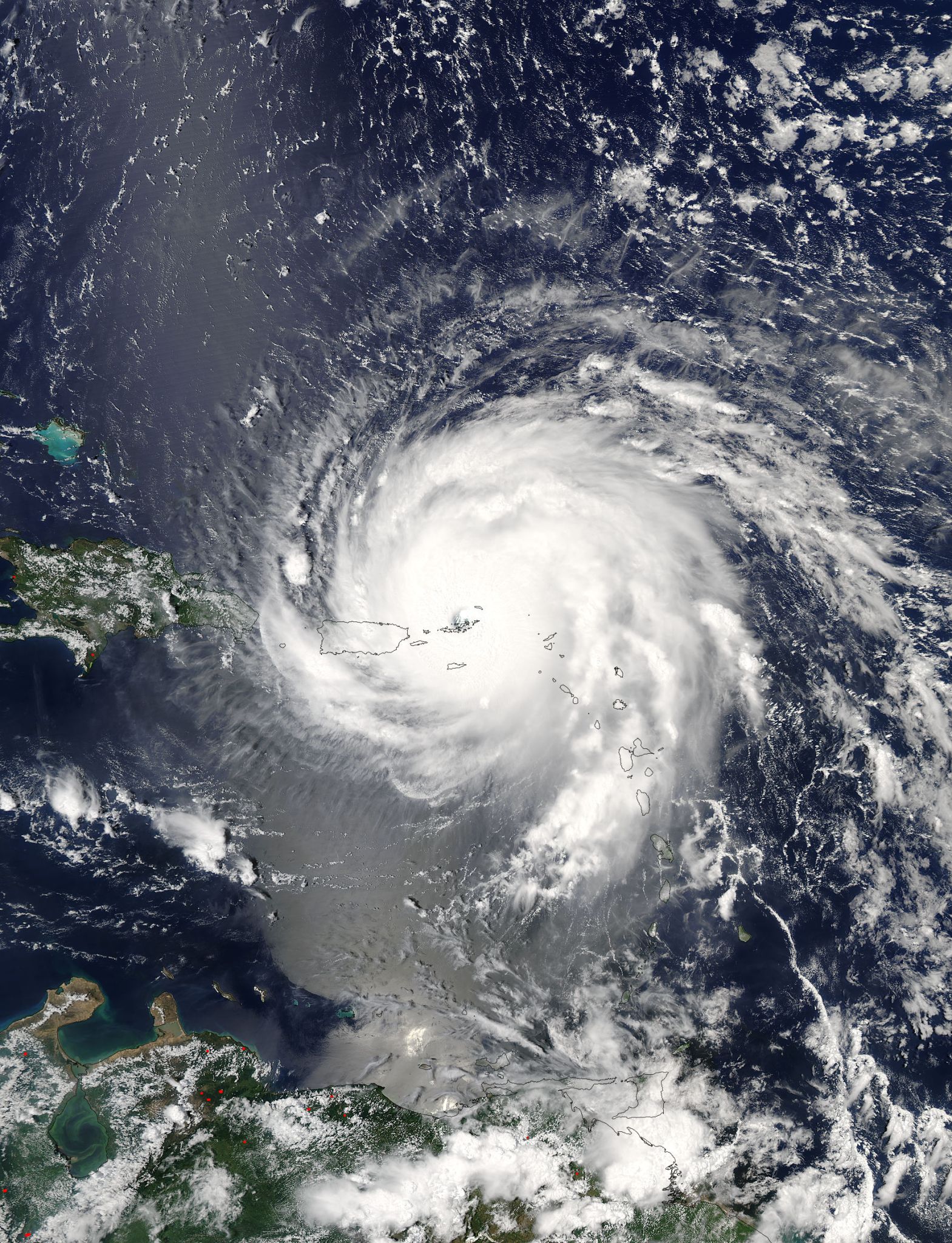Satellite image of Irma, a swirling cloud mass over the Atlantic Ocean.