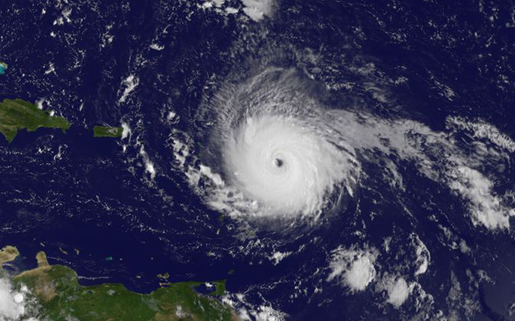 Satellite image of Irma, a swirling mass of clouds over the ocean.