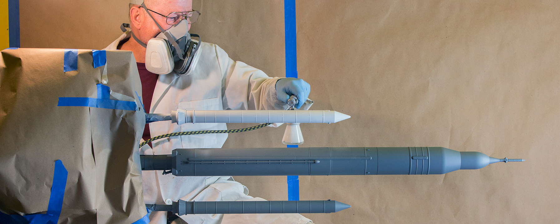 A Wind Tunnel Test Article of the Space Launch System is Prepared and Painted for Testing