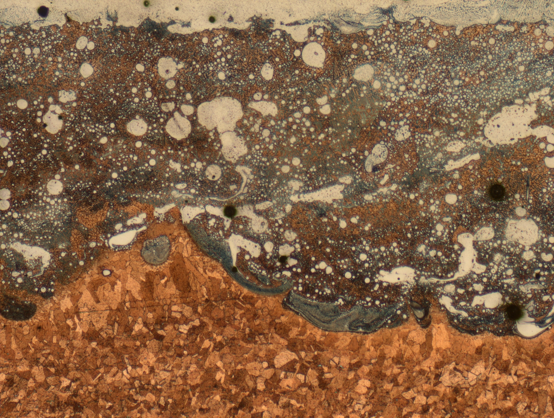 An image from a microscope reveals how the two metals, copper alloy and Inconel, mix and interlock to form a strong bond.