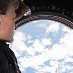 Astronaut looking out of the ISS cupola