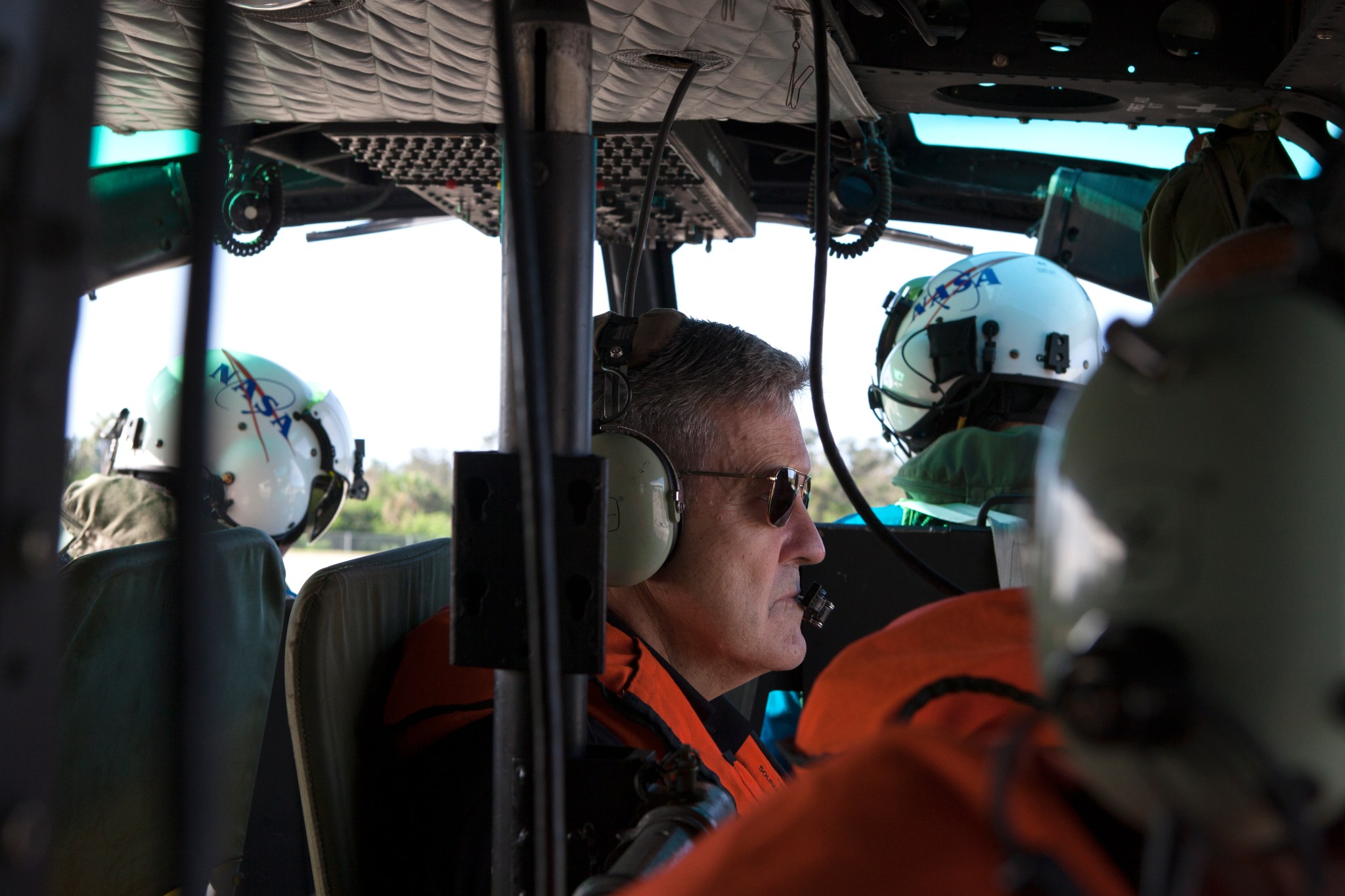Kennedy Space Center Director Robert Cabana boards a helicopter to conduct an aerial survey of the center.