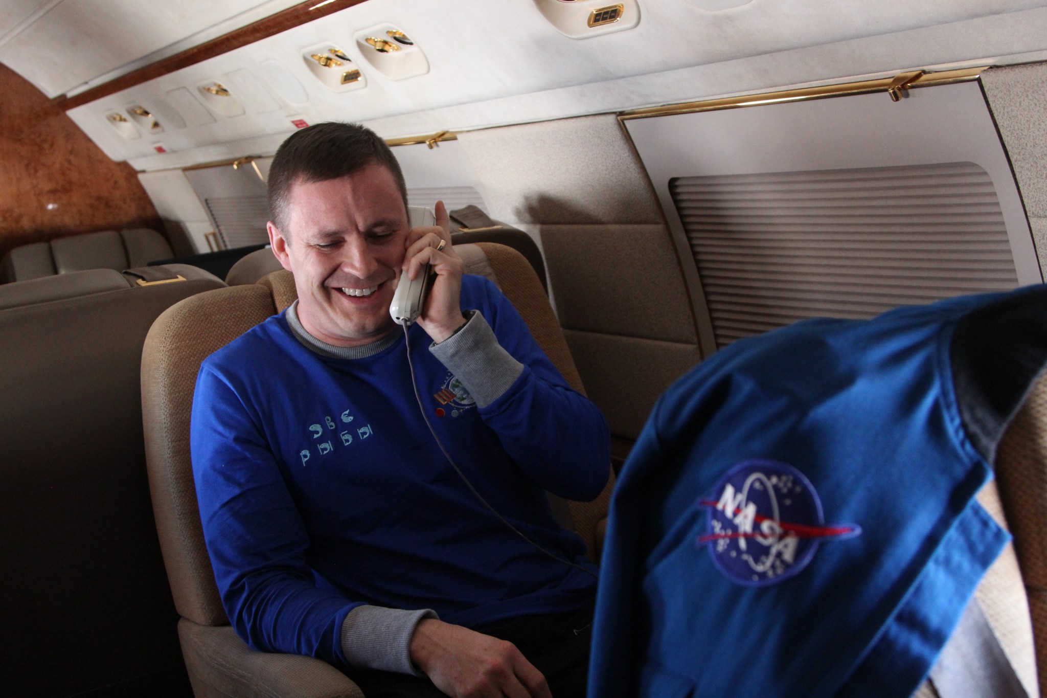 NASA astronaut Jack Fischer talks on the phone with President Donald Trump.