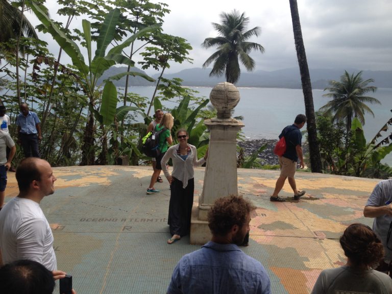 At the equator marker, with one foot in either hemisphere.