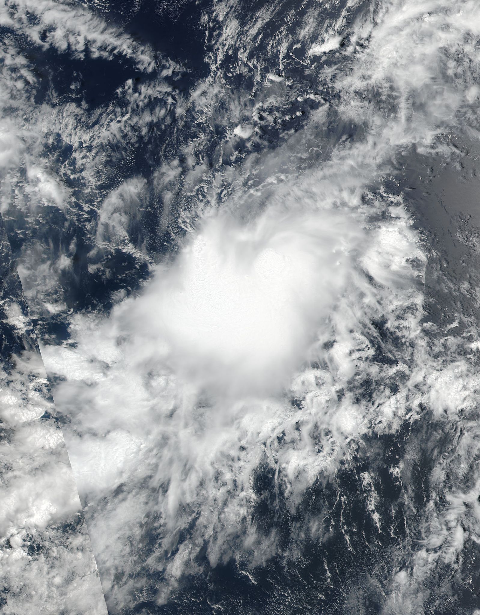 Satellite image of Jose with a white cloud mass over the ocean.