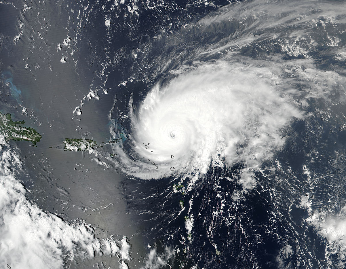 Satellite image of Jose, a swirling cloud mass with a clear eye, over the Atlantic Ocean.