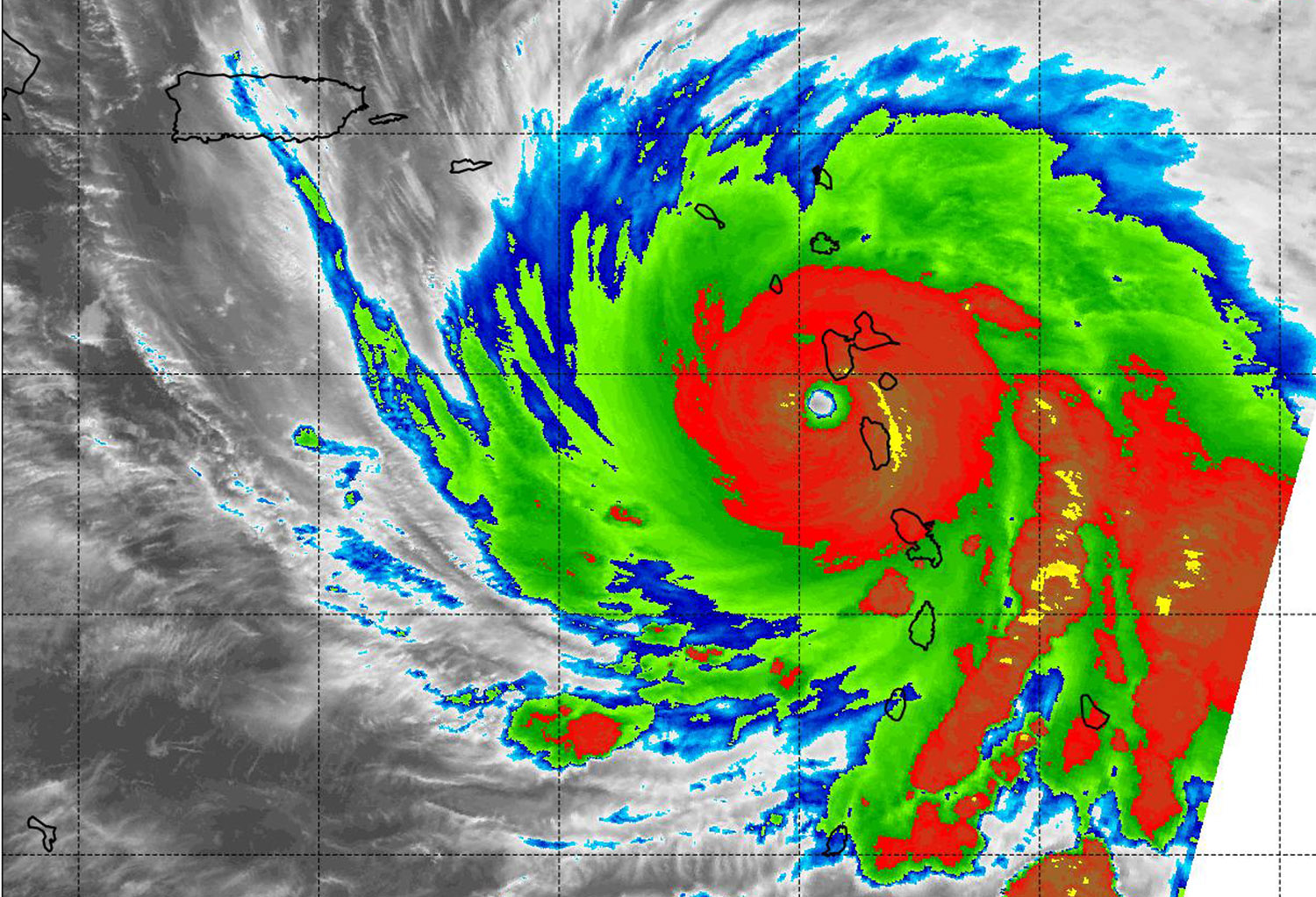 MODIS image of Maria with cloud temperatures indicated in reds, blues, and greens.