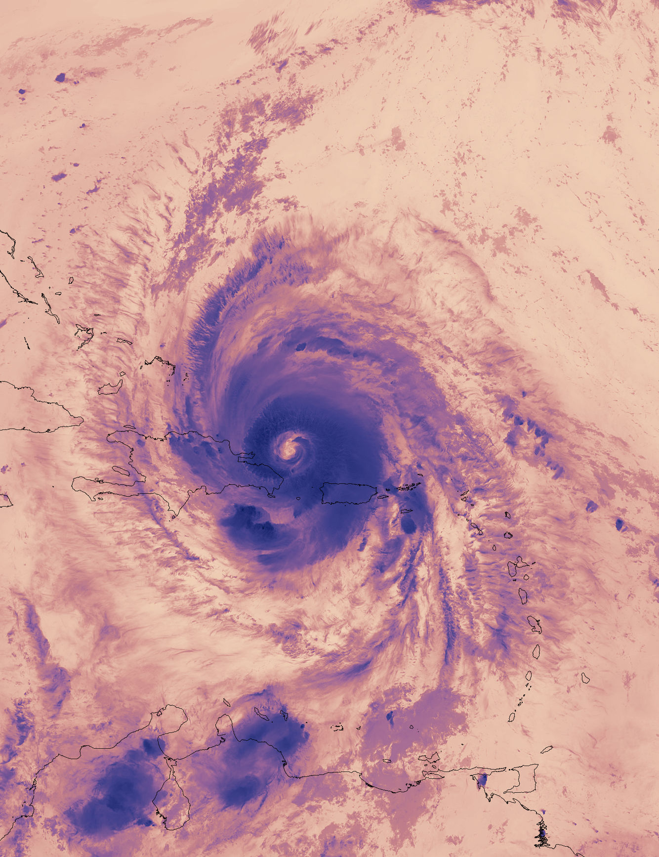 Suomi NPP image thermal view of Maria with clouds in dark purple.