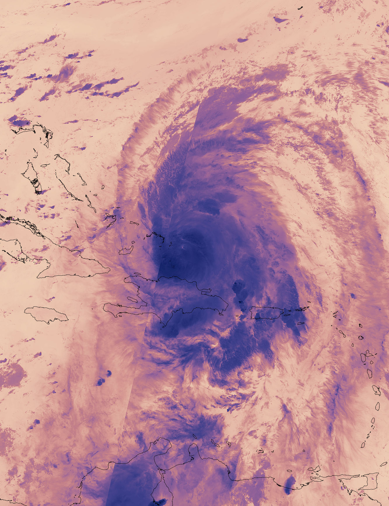 Suomi NPP image of Maria with the clouds in light purple.