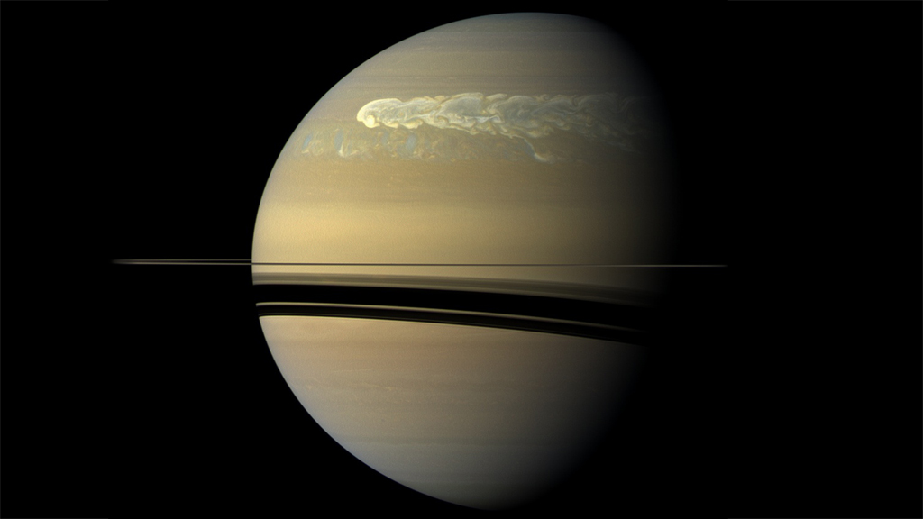 Saturn, bright smear on upper side