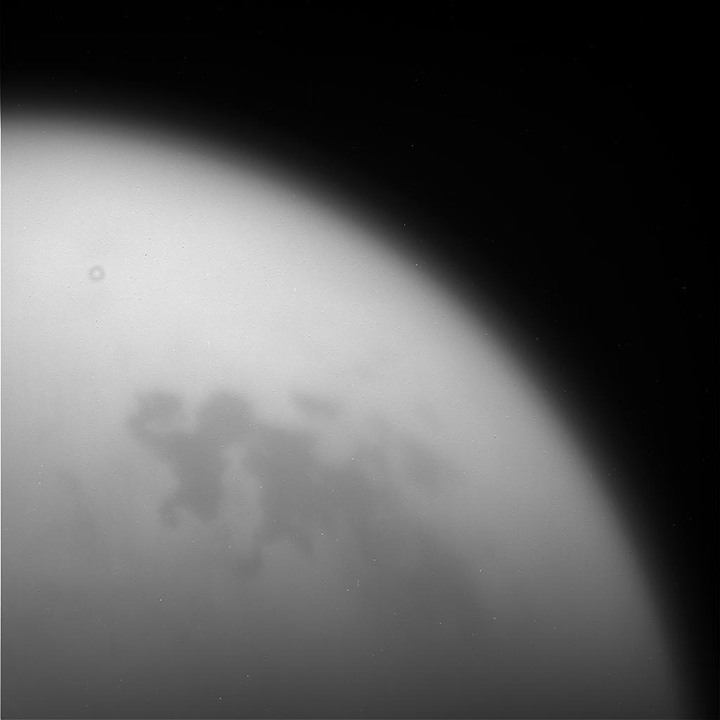 This unprocessed image of Titan was taken by NASA's Cassini spacecraft during the mission's final, distant flyby on Sept. 11.