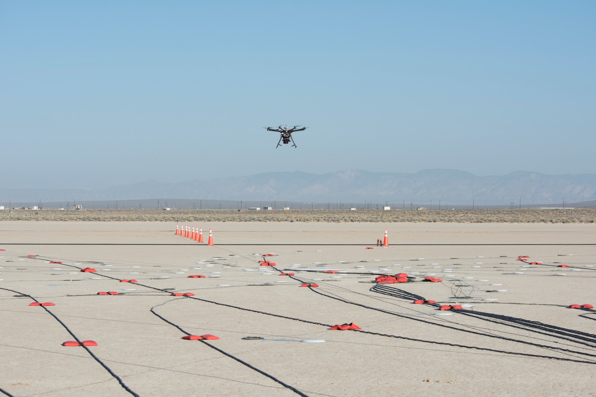 A small unmanned aircraft system was used to test and validate a microphone array, designed by NASA Langley and positioned on th