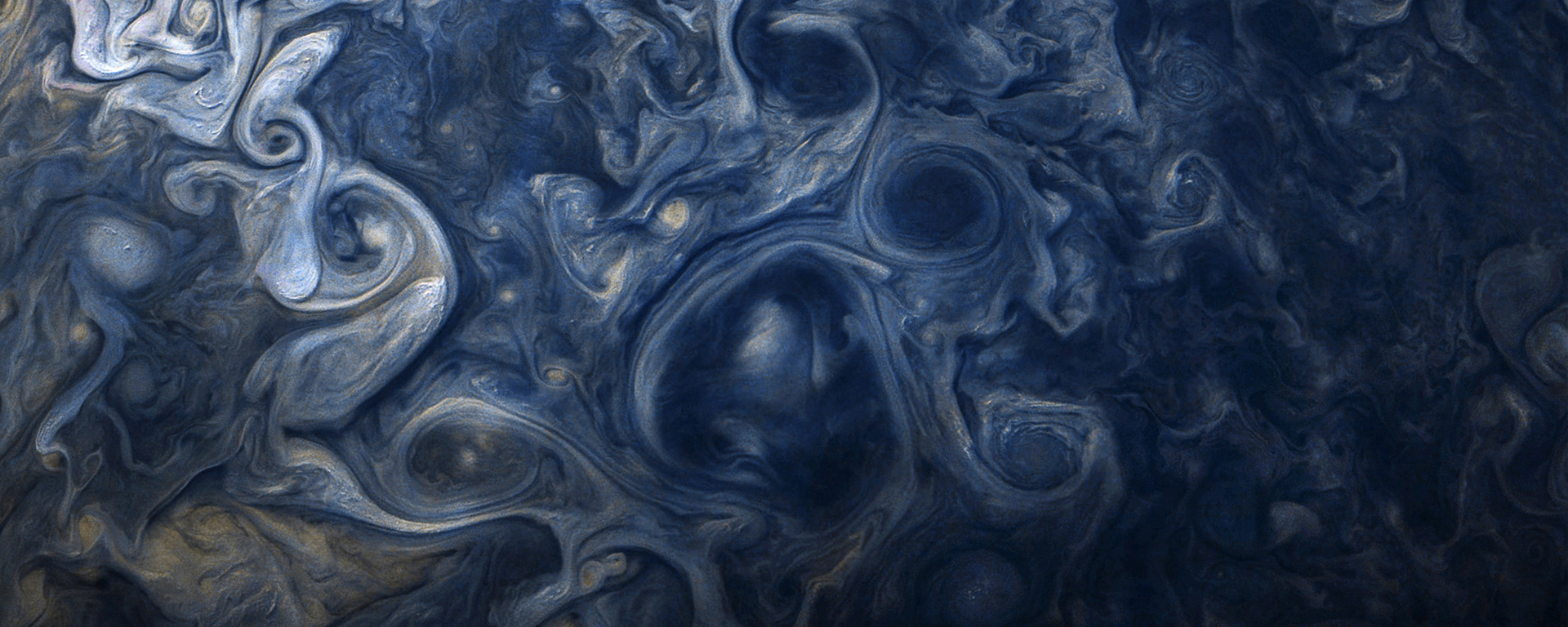 Jovian clouds in striking shades of blue in this new view taken by NASA’s Juno spacecraft.