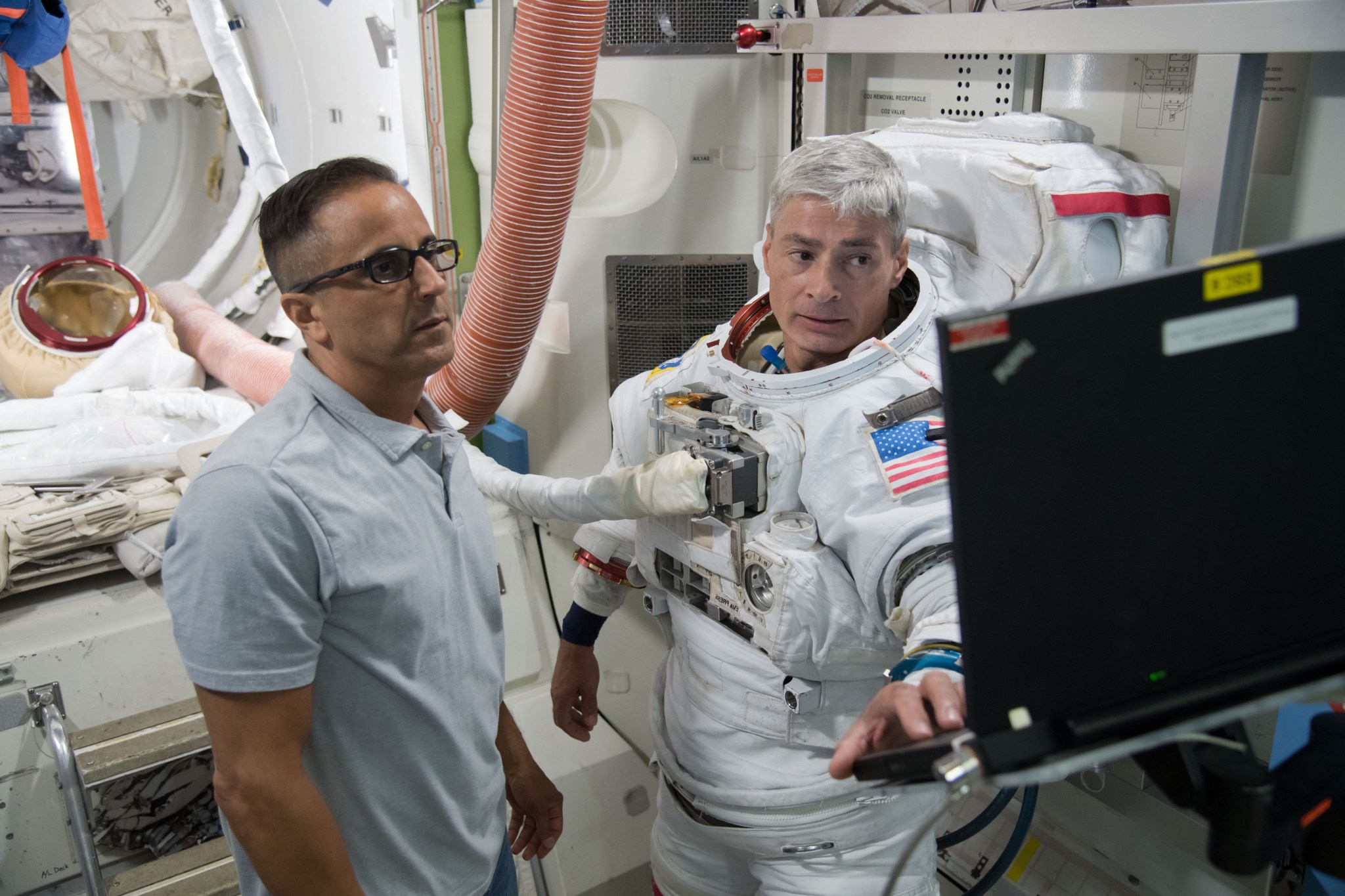 Photograph Expedition 53/54 crew members Mark Vande Hei and Joe Acaba 