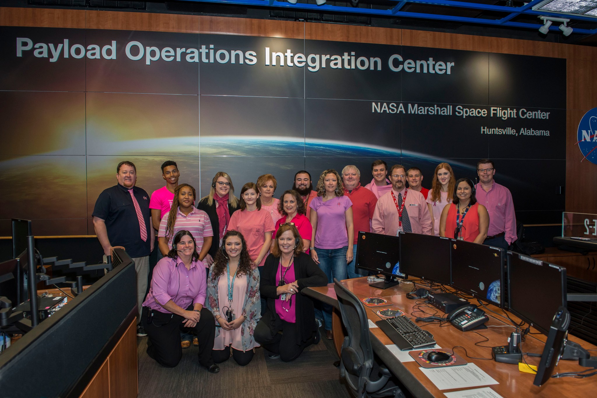POIC team members wore pink on Oct. 20 to mark Breast Cancer Awareness Month.
