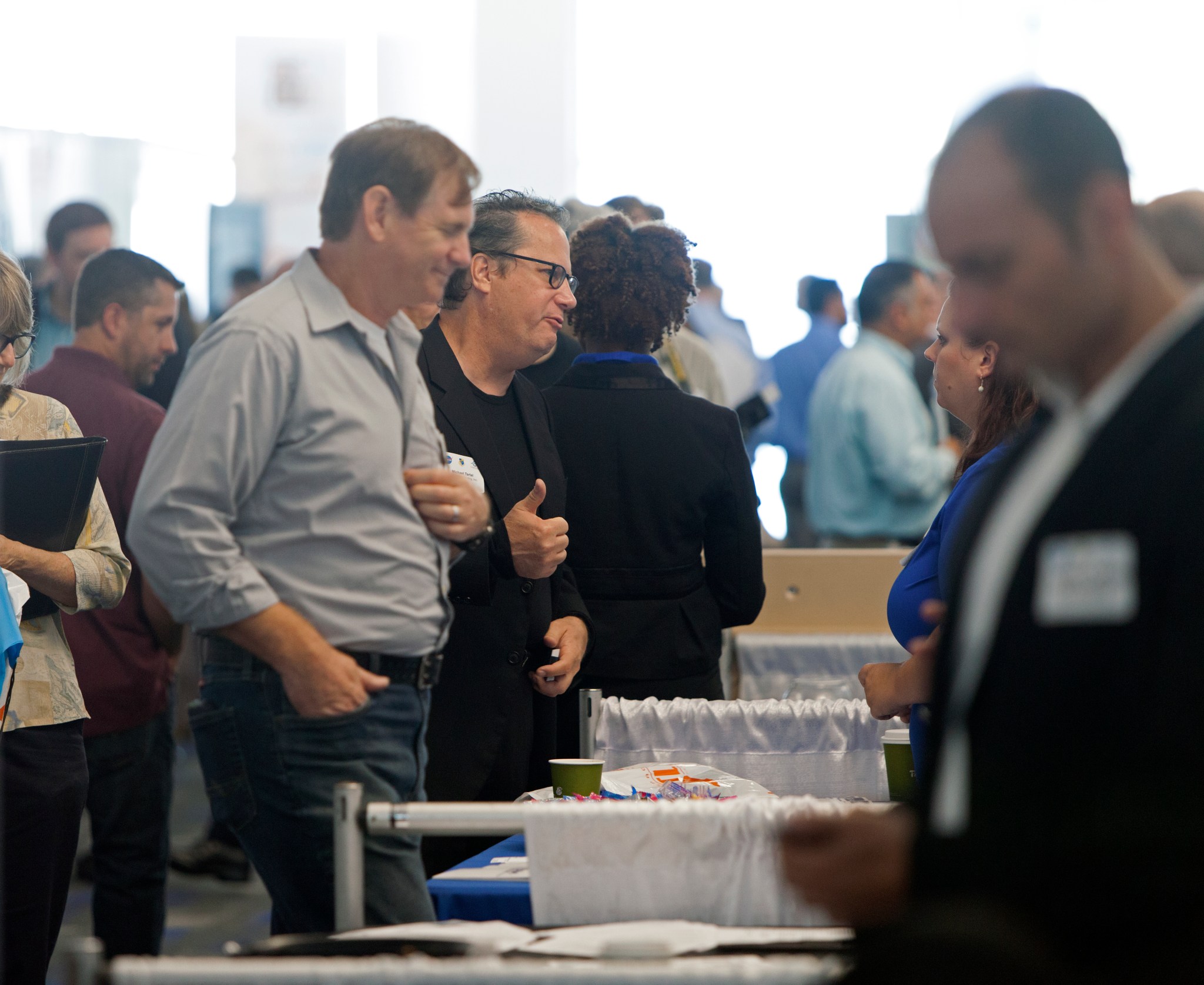 Attendees visitor exhibitor booths at the KSC Business Opportunities Expo on Oct. 24, 2017 at Port Canaveral in Florida.