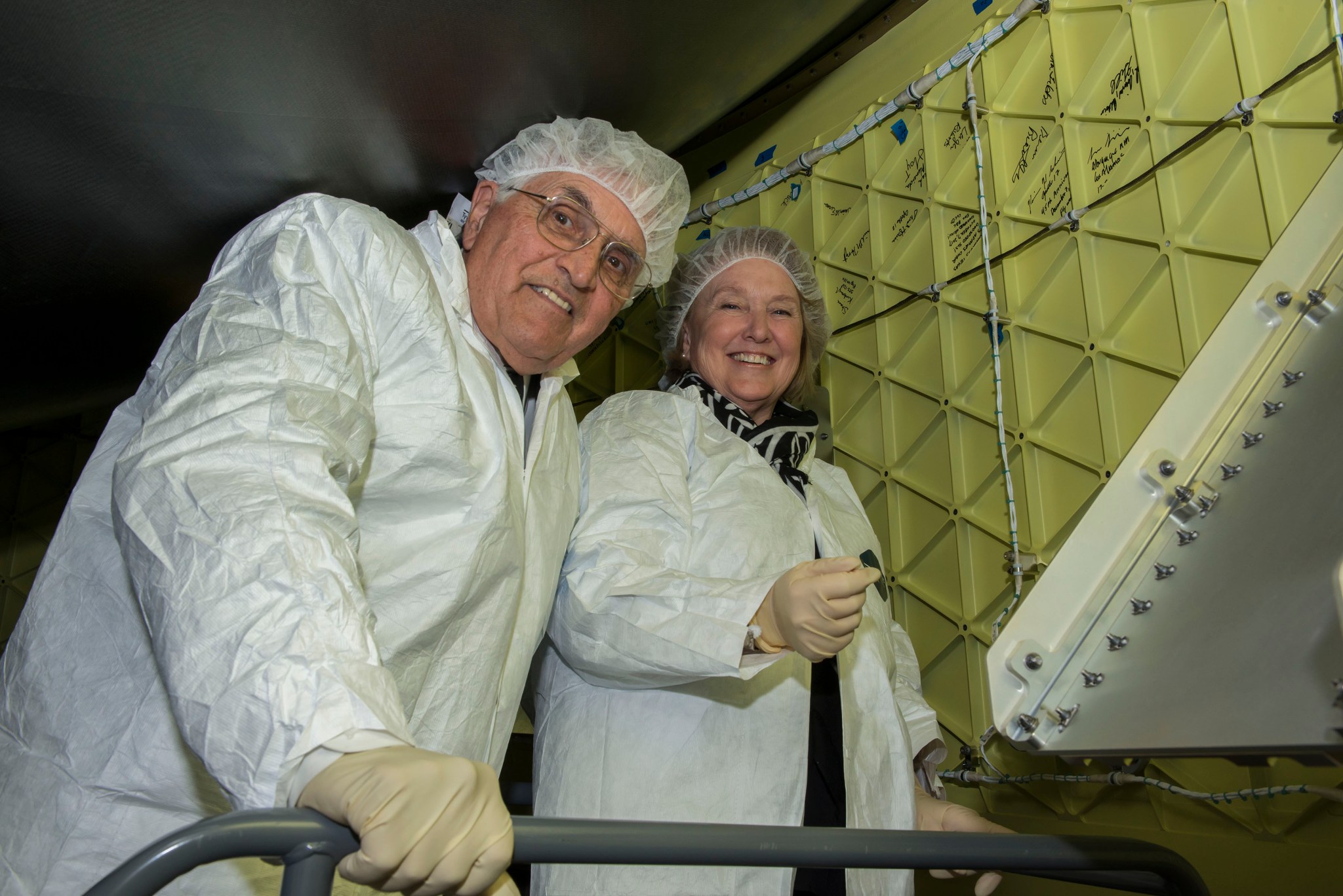 Schmitt and his wife, Teresa, toured the Orion Stage Adapter while at Marshall and signed it before its flight.