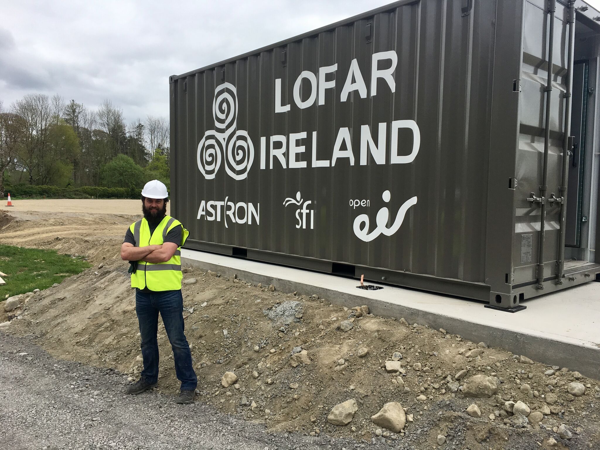 Milligan next to one of the truck-sized containers.