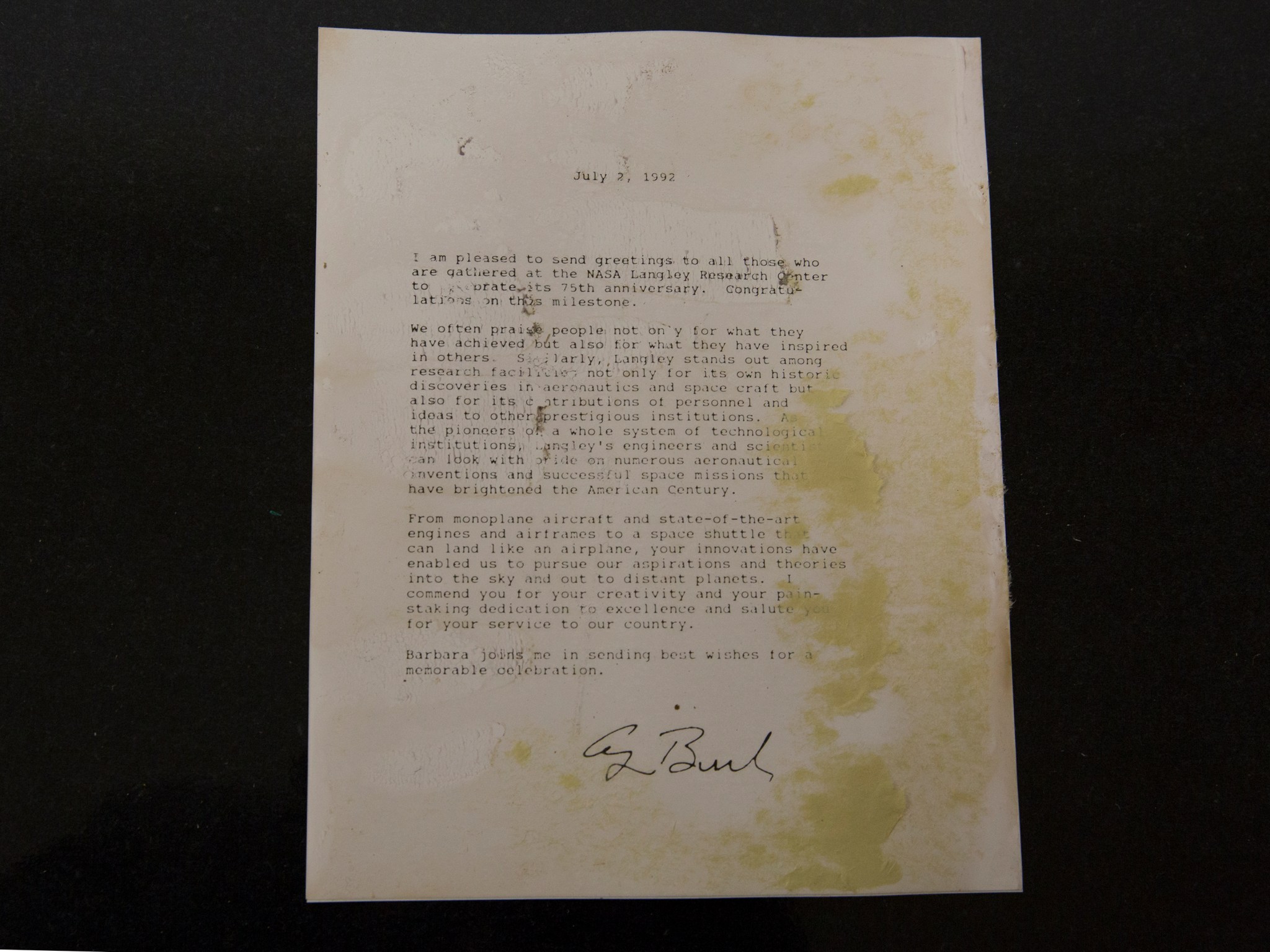 Physical items that were originally included in the time capsule include a July 2, 1992, letter signed by then-President Bush.