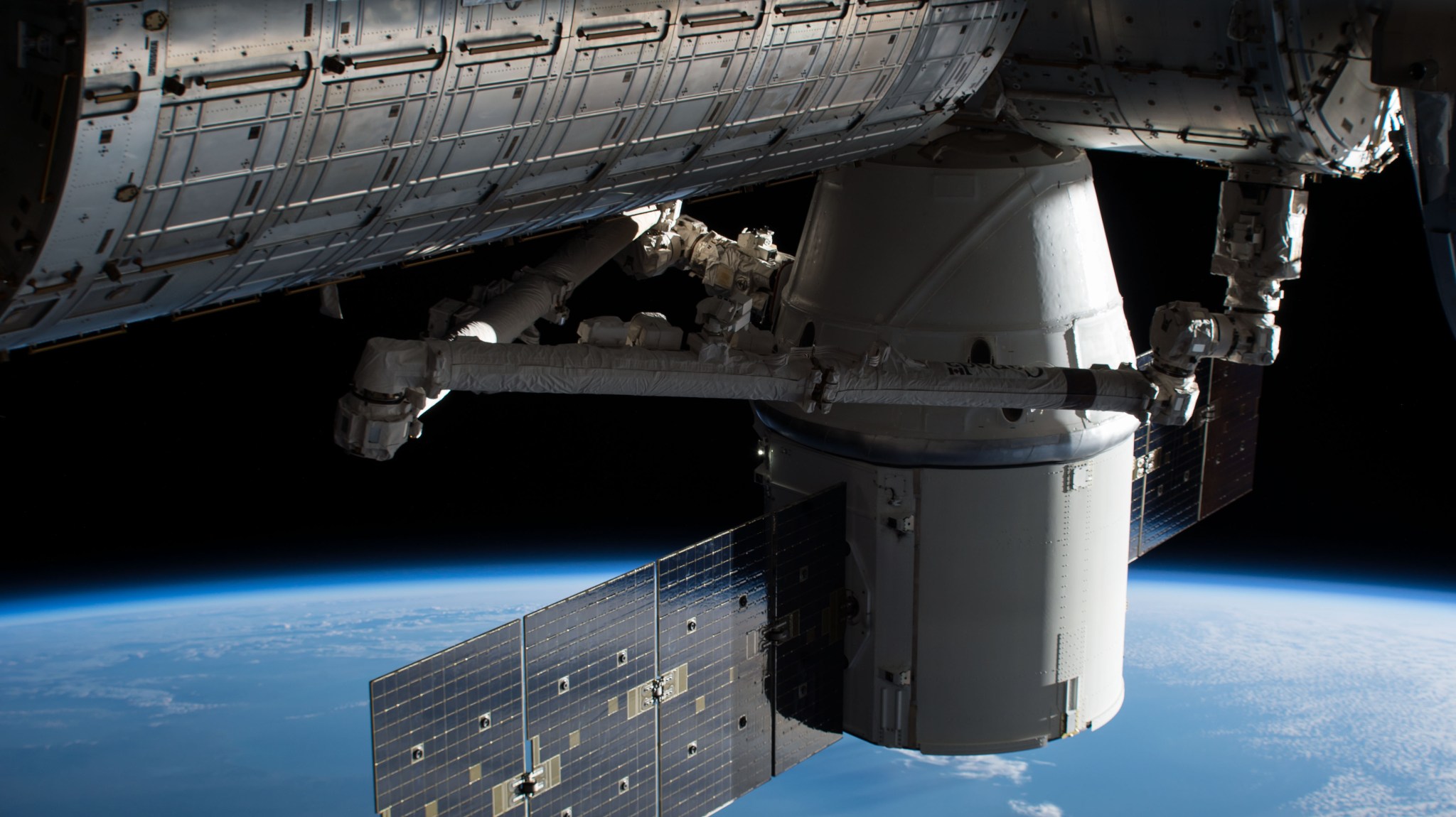 The SpaceX Dragon cargo craft is pictured attached to the Harmony module after it arrived on Dec. 17. 2017.