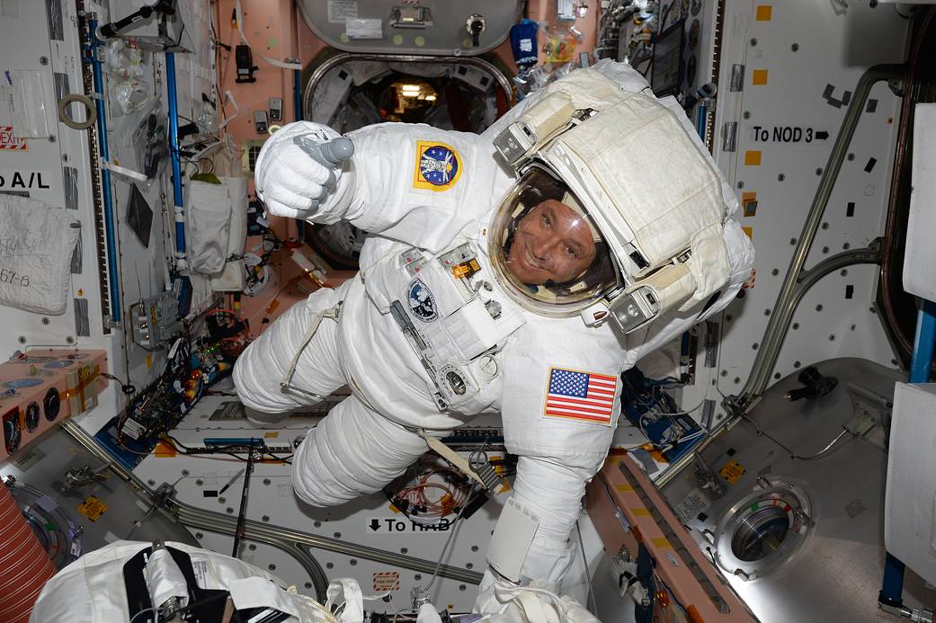 Astronaut Jack Fischer gives a thumbs up from the International Space Station.