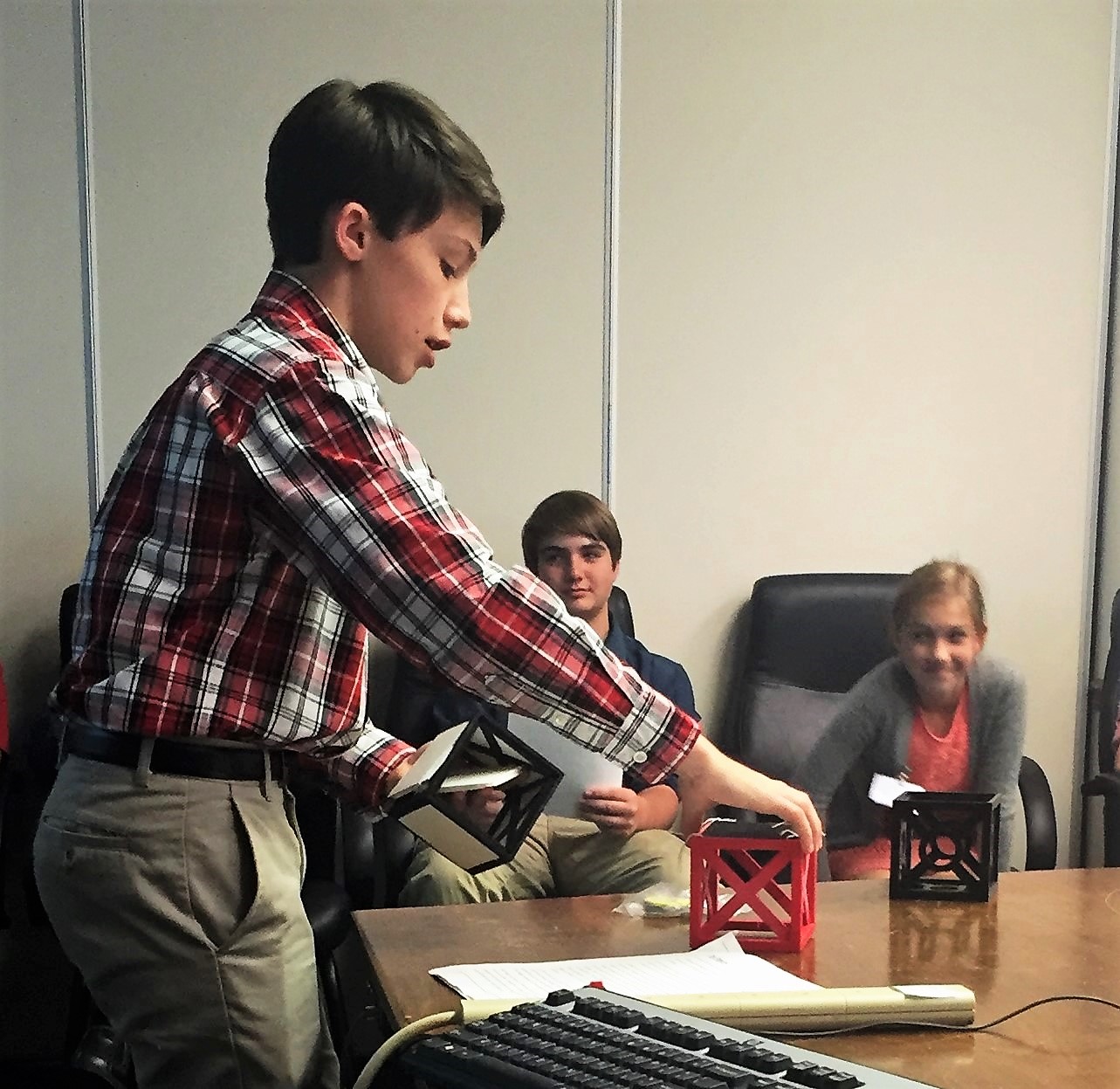 Students at Robertsville Middle School in Oak Ridge, Tennessee, design a 1U CubeSat as part of an elective course.