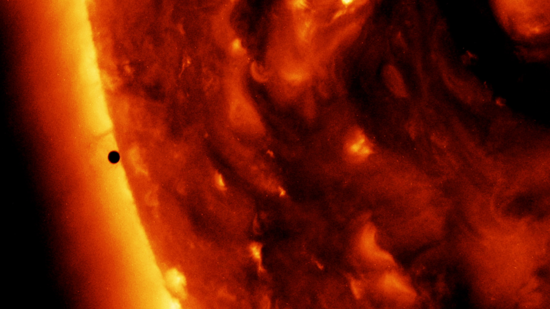 Mercury transiting the Sun, seen by SDO