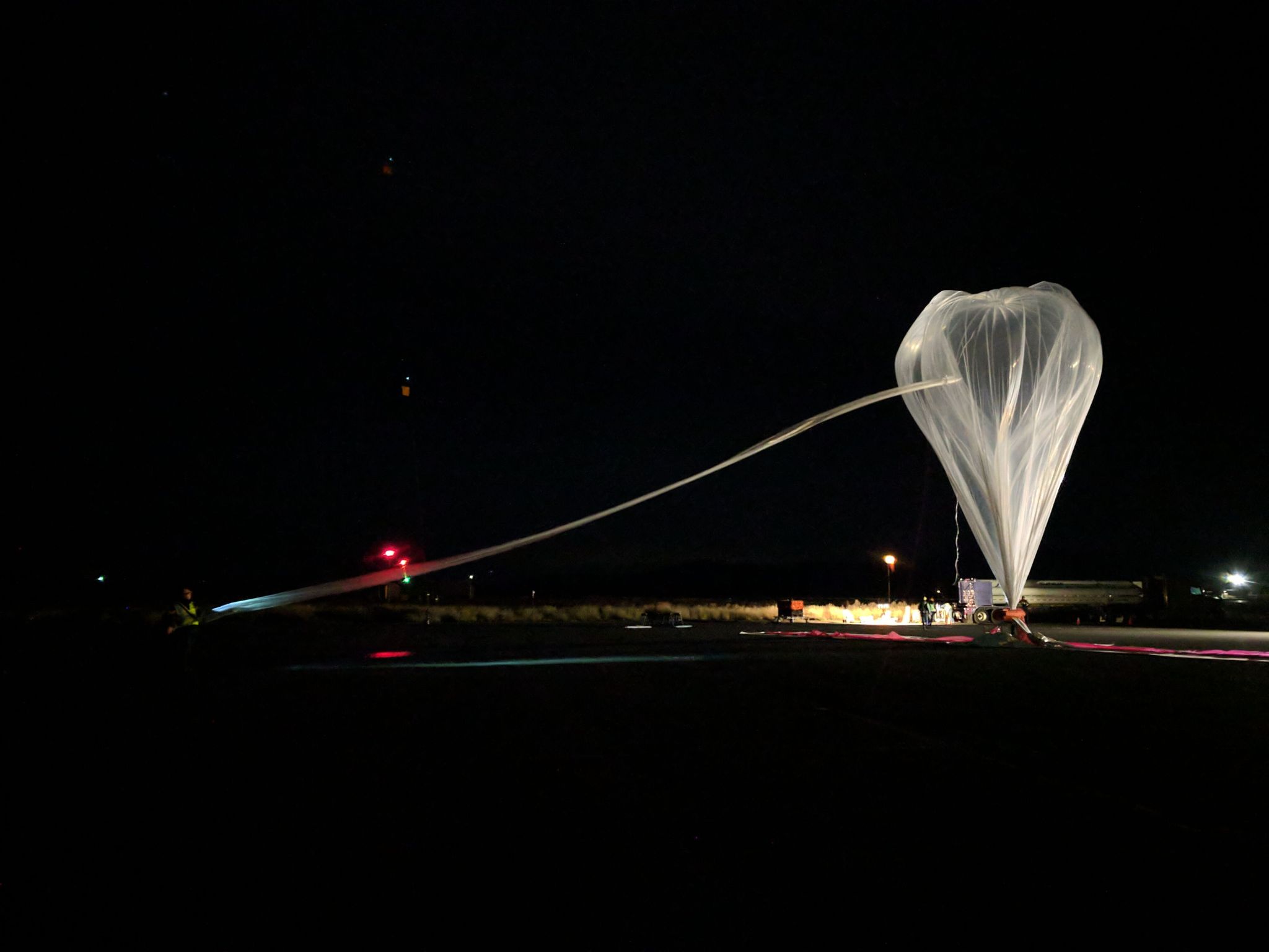 The World View team prepares their high-altitude balloon at McCall Idaho Municipal Airport.