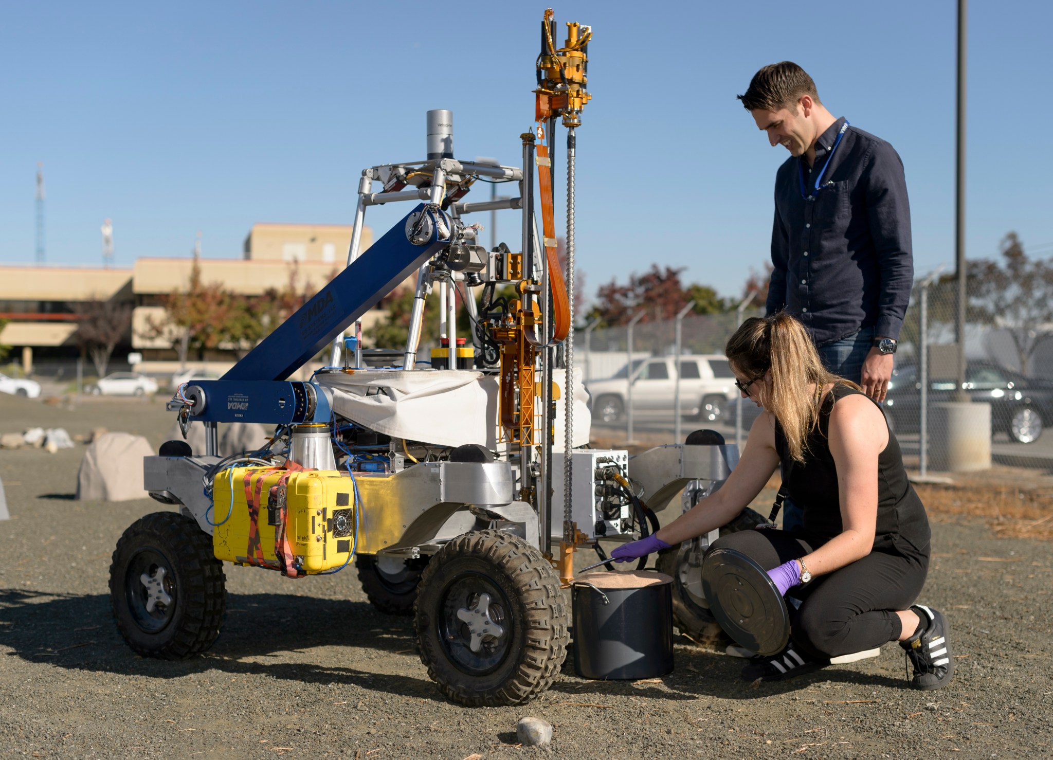 ARADS team members Dean Bergman and Mary Beth Wilhelm prepare to test the drill installed on the K-REX2 rover.