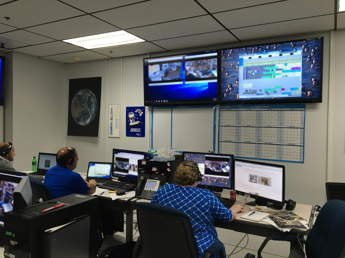 Managers at Kennedy Space Center monitor the Advanced Plant Habitat first grow out on the International Space Station.