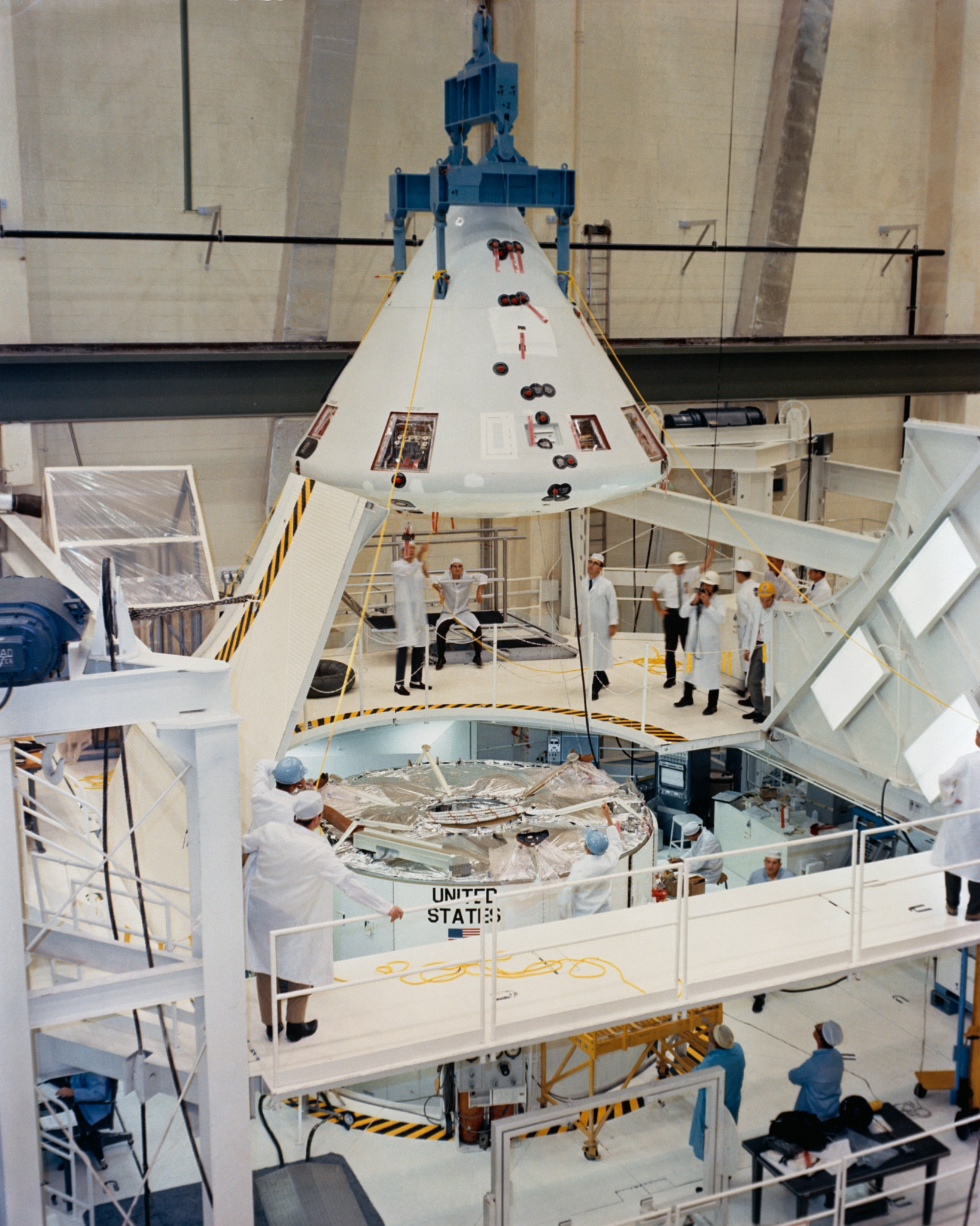 The Apollo 6 Command Module being mated with its Service Module.