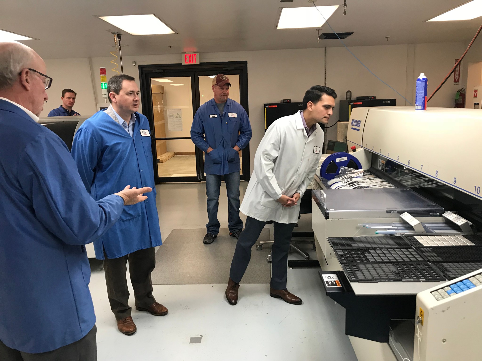 NASA officials on a visit to Frontier Electronic Systems, a small business in Stillwater, Oklahoma.