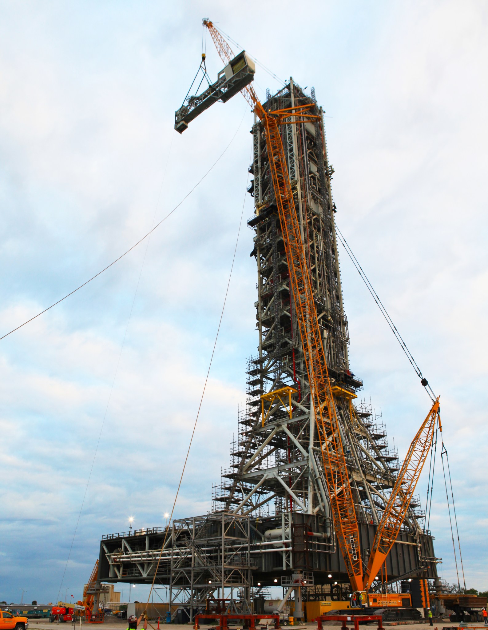 A crane positions the Orion crew access arm
