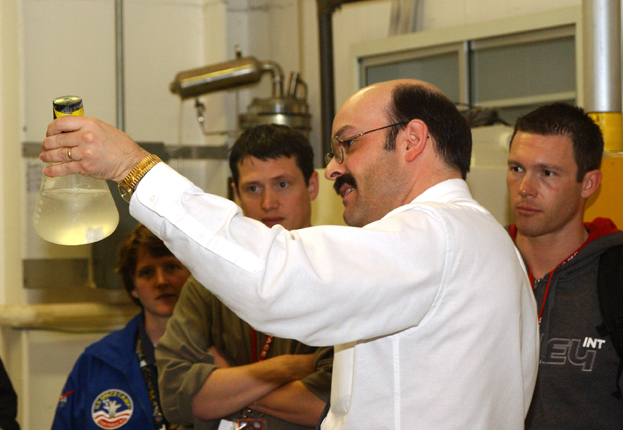 Marshall engineer and ECLSS team lead Keith Parrish gives visitors an up-close look at an example of ECLSS technology.