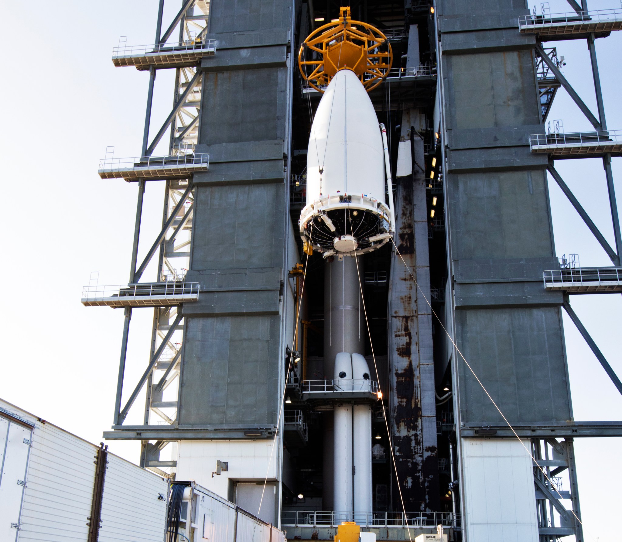 Payload fairing containing NOAA's GOES-S is lifted