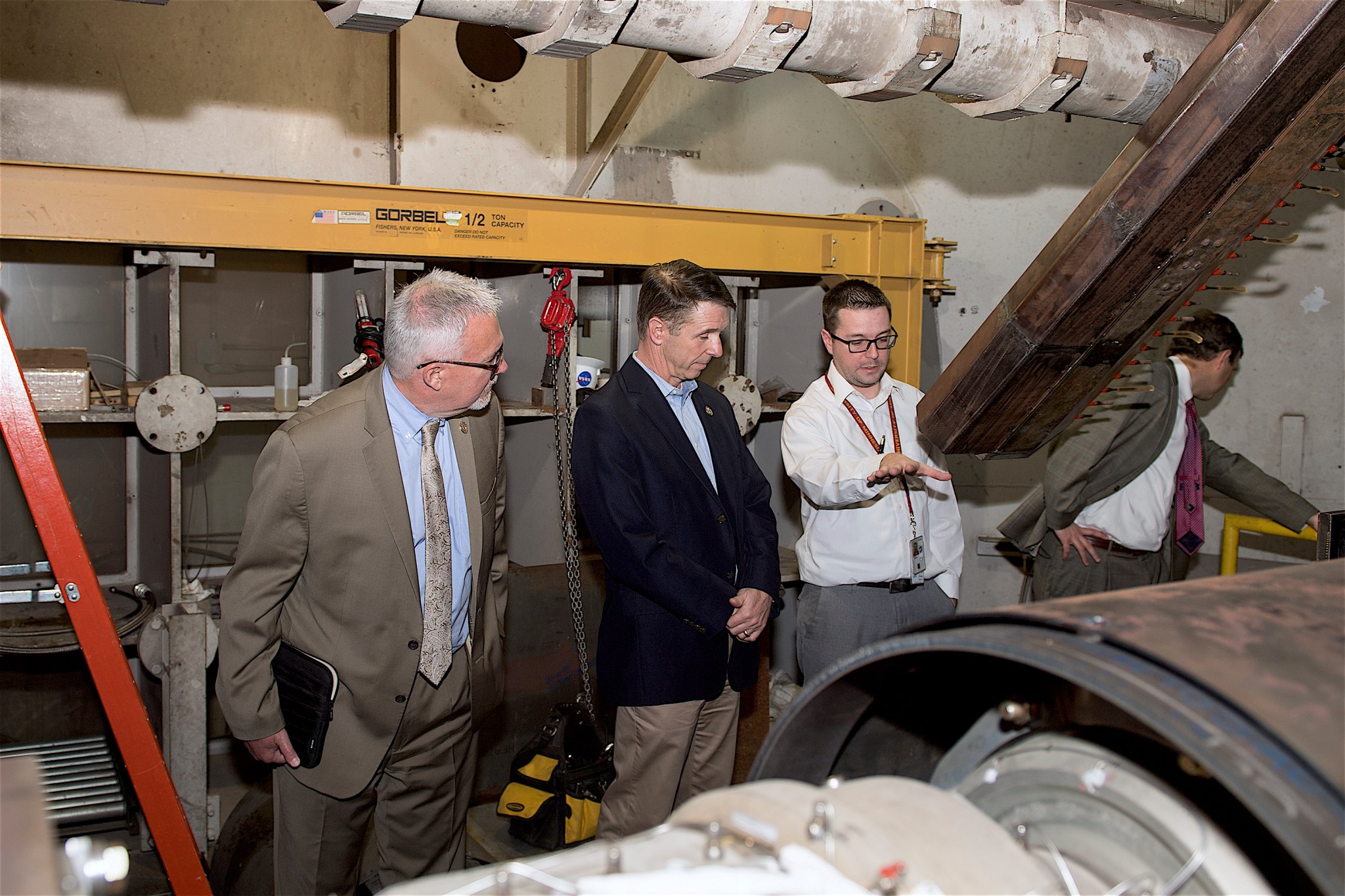 Langley’s director, Dave Bowles; Congressman Rob Wittman and researcher Aaron Fuchs in the hypersonic wind tunnel complex.
