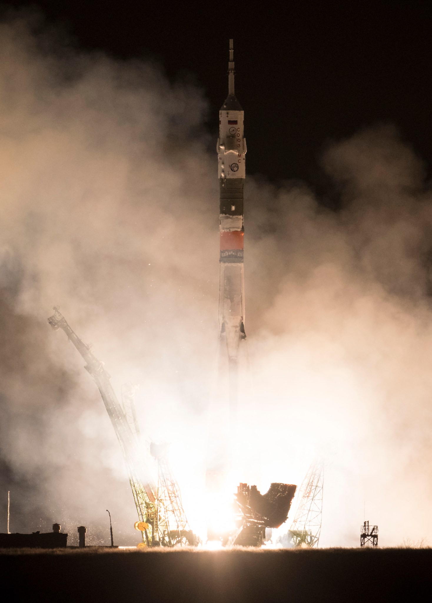 NASA astronauts Drew Feustel and Ricky Arnold, and Oleg Artemyev of the Russian space agency Roscosmos, launch March 21, 2018