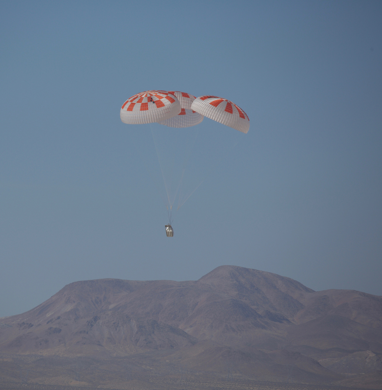 SpaceX performed its fourteenth overall parachute test supporting Crew Dragon Development March 4, 2018, over the Mojave Desert 