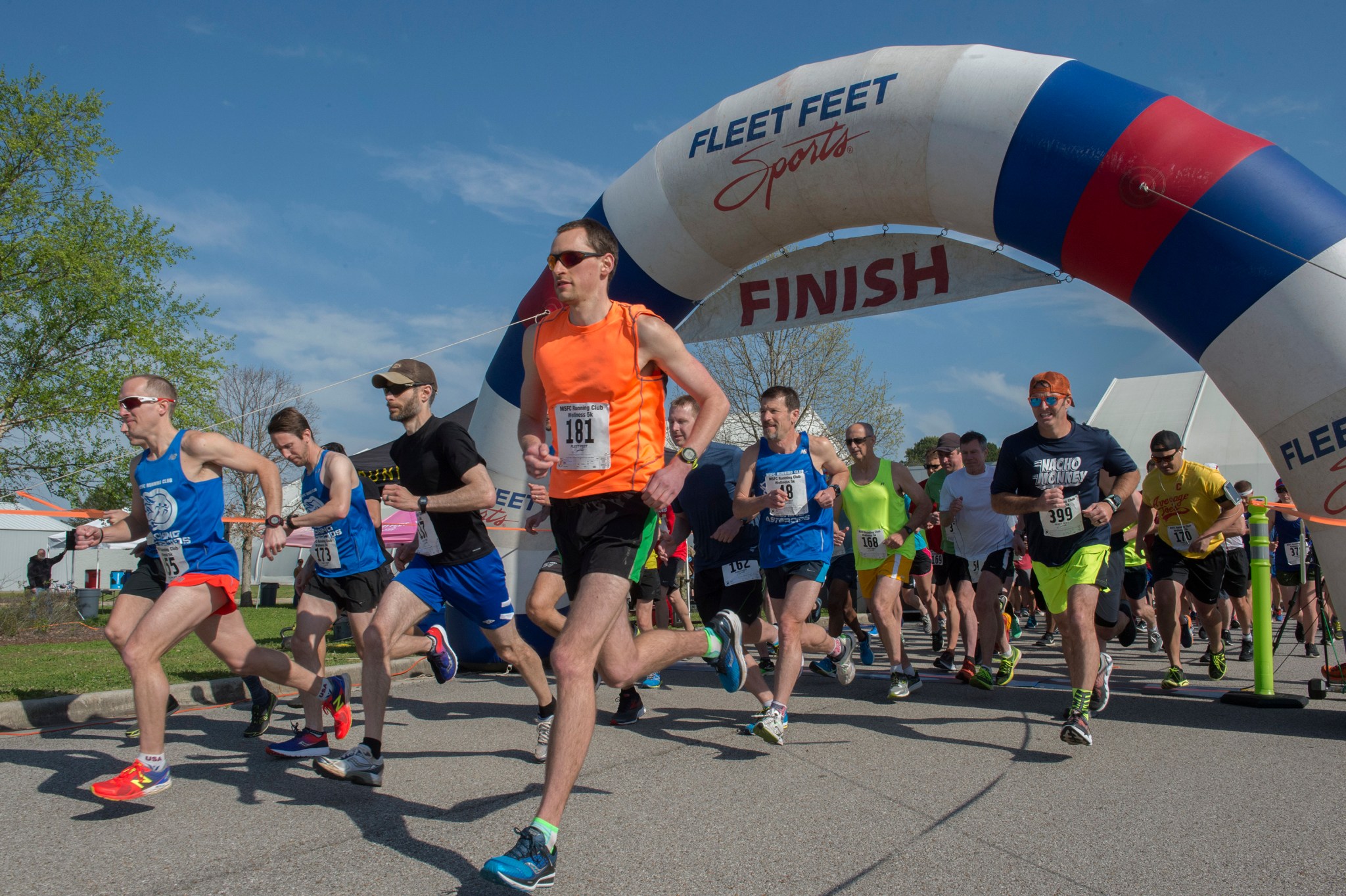 Runners take off from the starting line at NASA Marshall Space Flight Center's Running Club 5K race April 18.