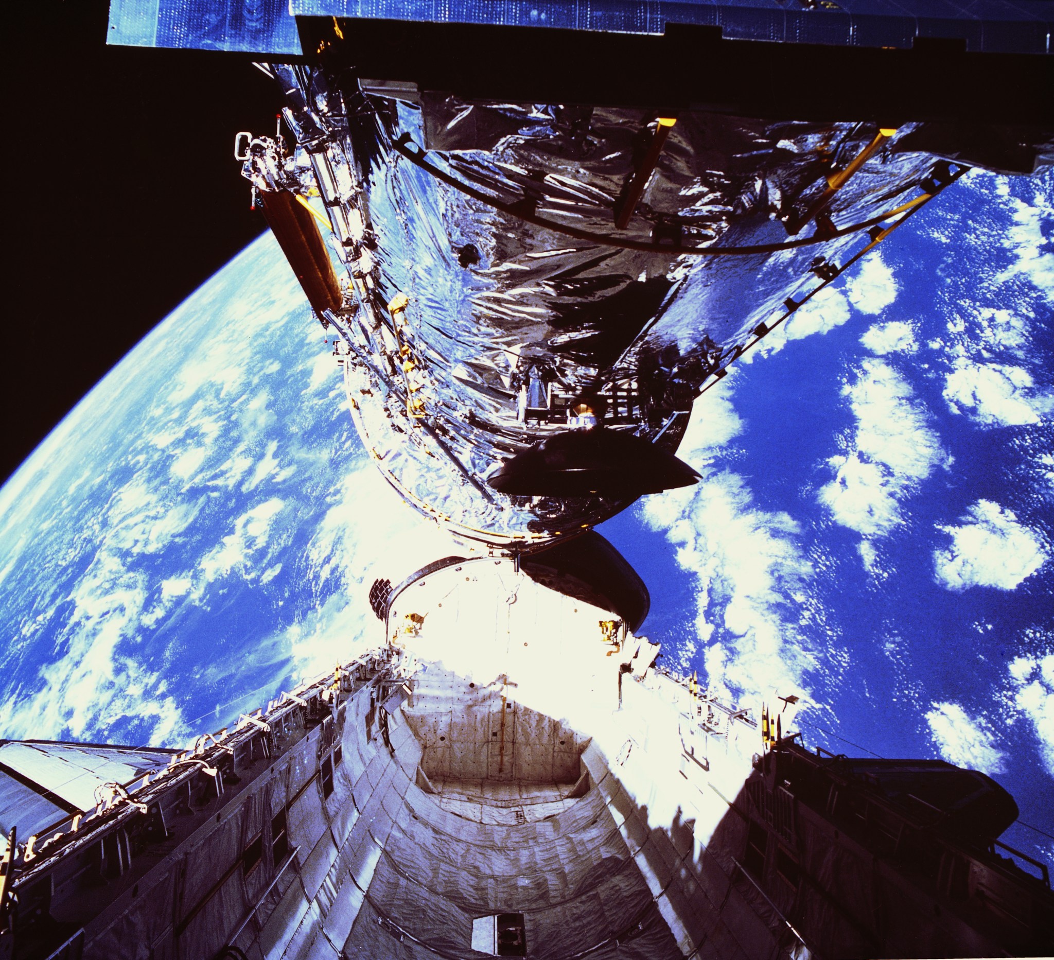Hubble clears the orbiter’s cargo bay during its deployment on April 25, 1990.