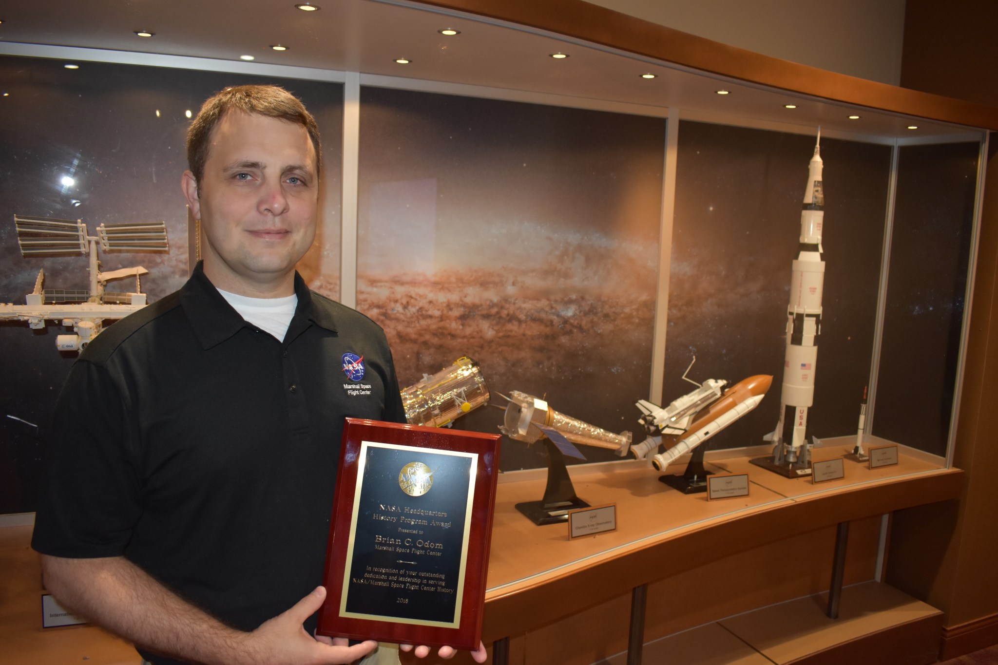 NASA Marshall Space Flight Center Historian Brian Odom received the annual NASA History Award.