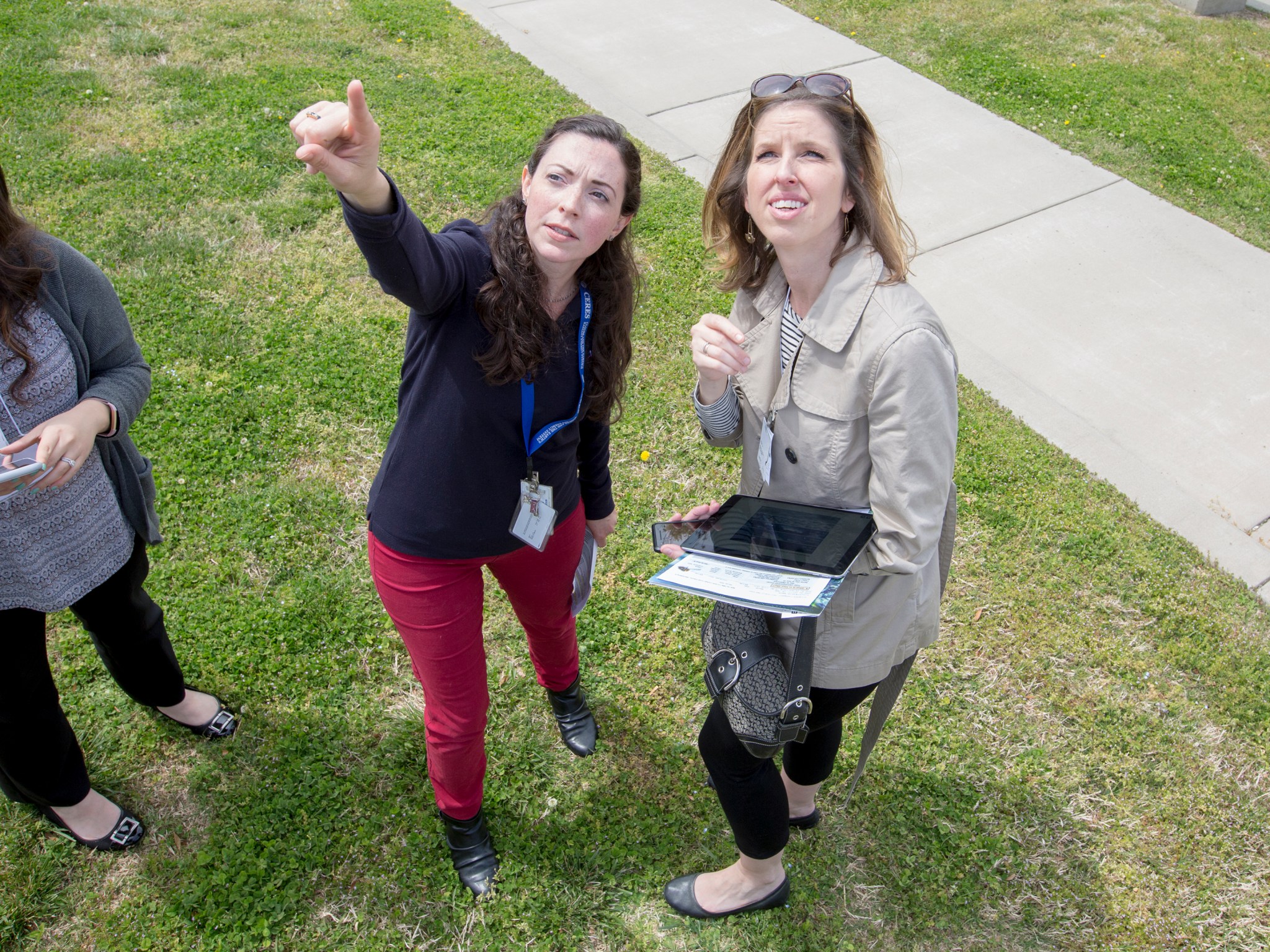 NASA Langley physical scientist Jessica Taylor shows local teachers Monday how to observe clouds via the GLOBE program.