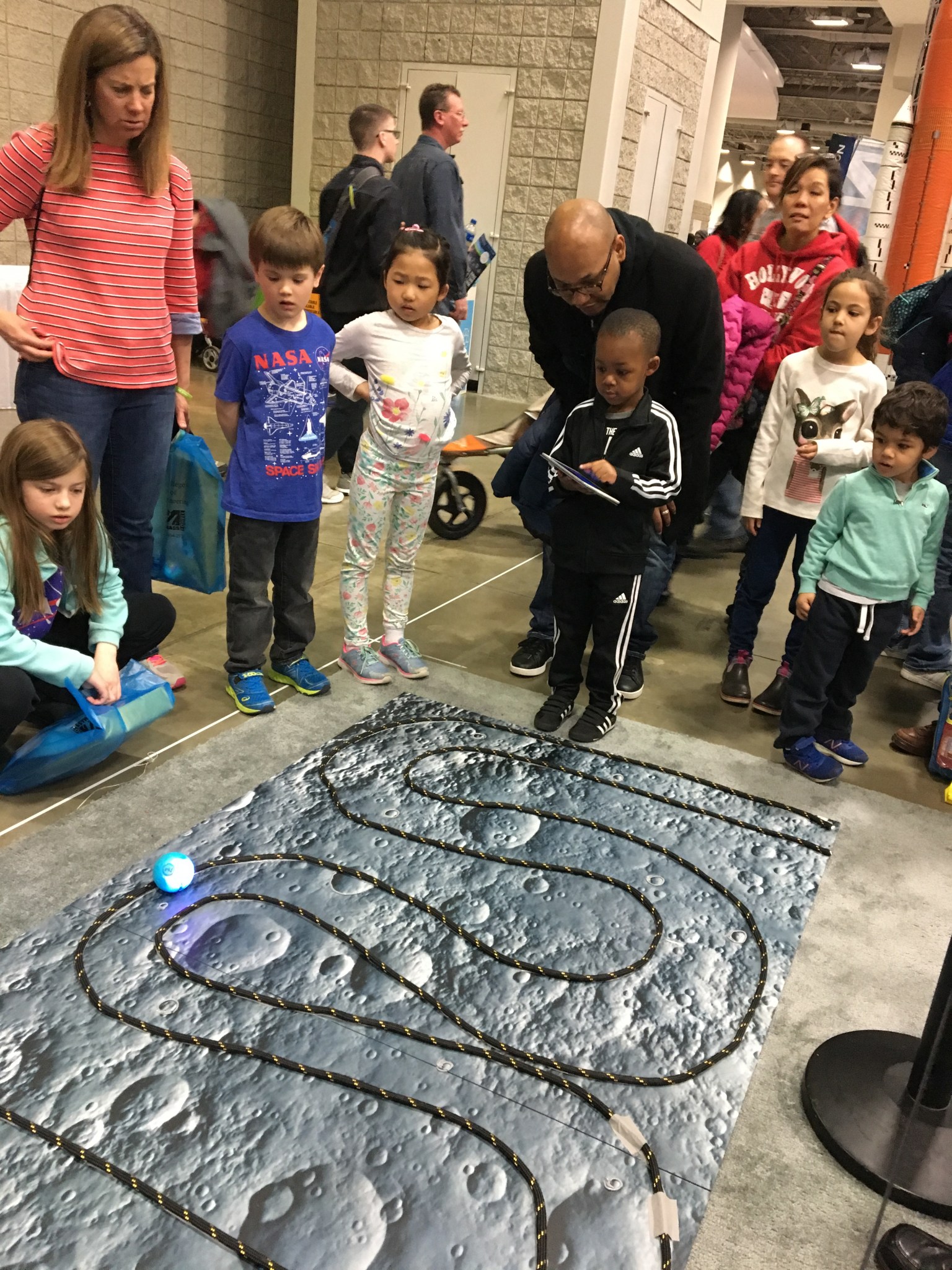 Young astronauts-in-training were challenged with driving a “spherobot” through a moonscape obstacle course.