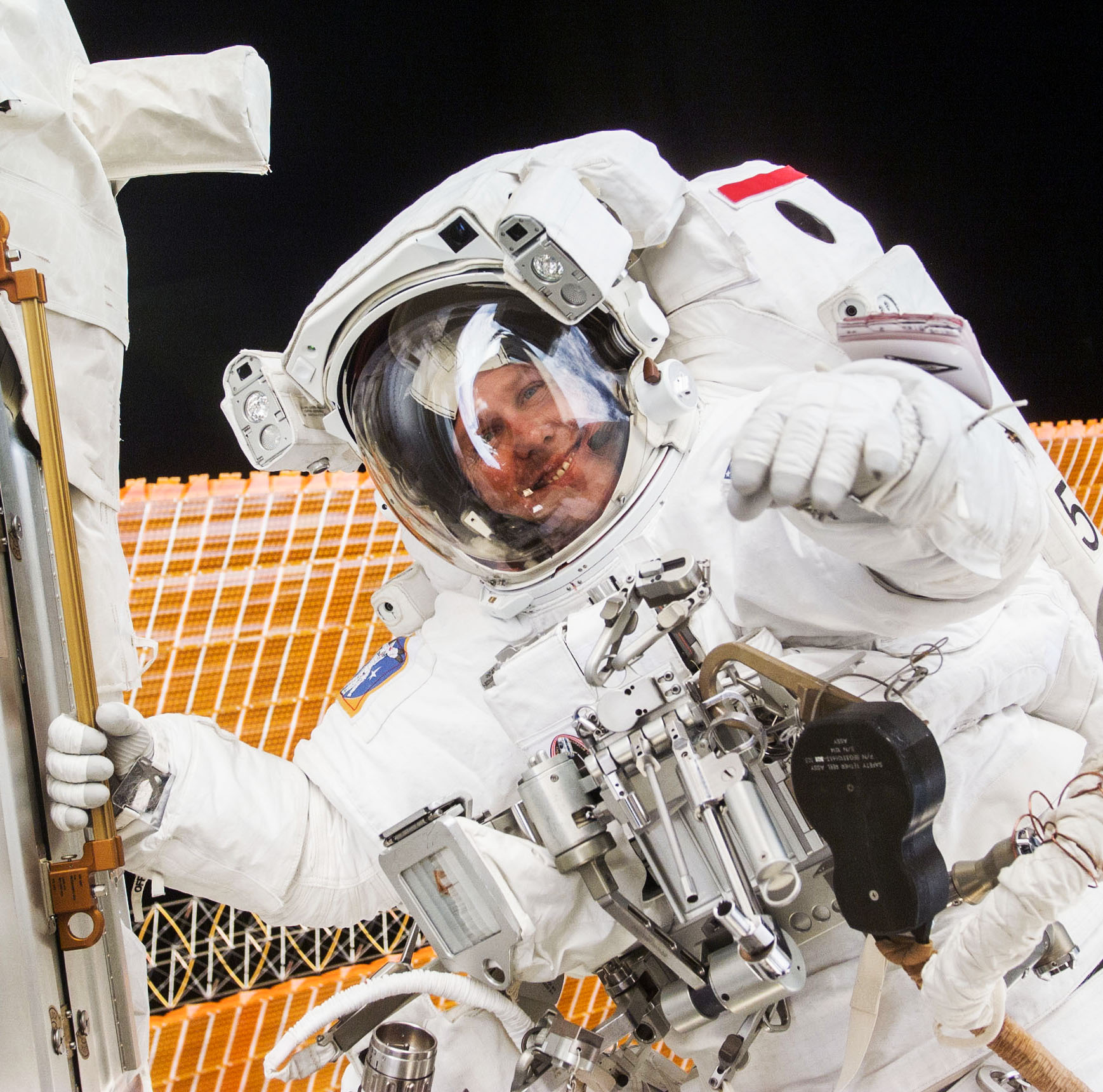 Tom Jones performs a spacewalk to work on the International Space Station during the STS-98 mission.